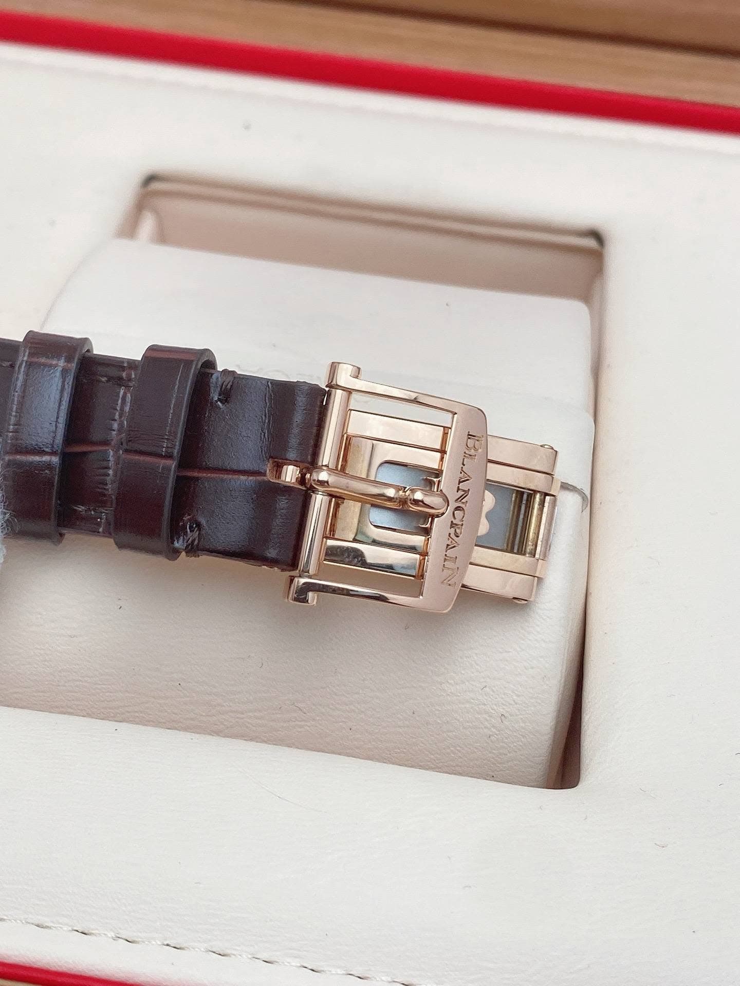 May be an image of wrist watch and jewelry
