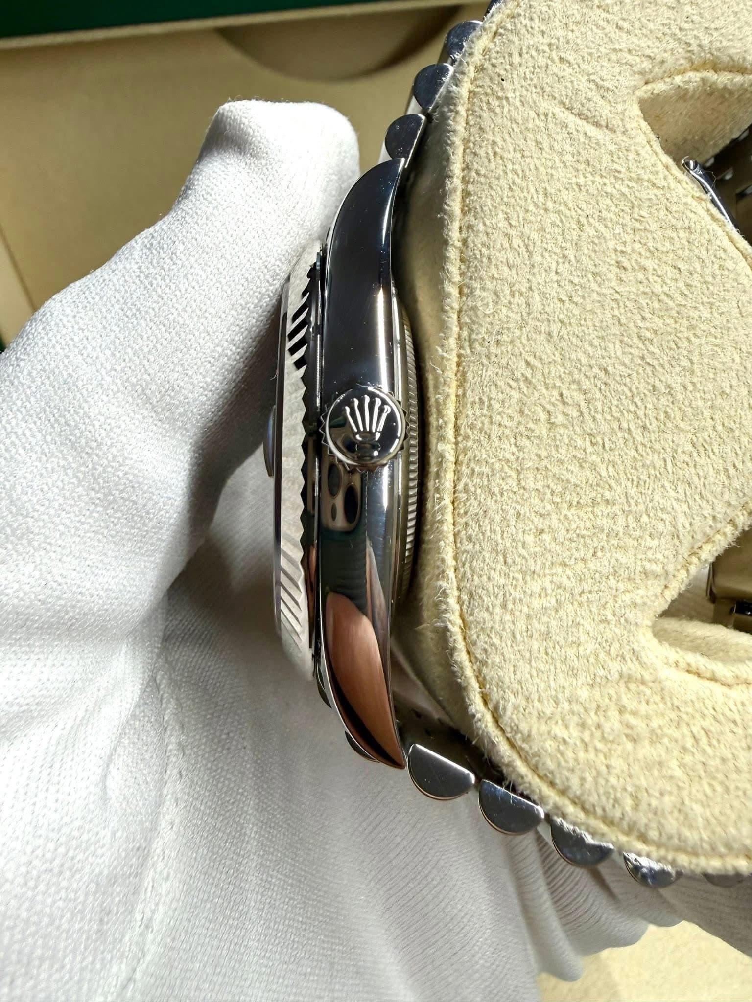 May be an image of wrist watch and leather