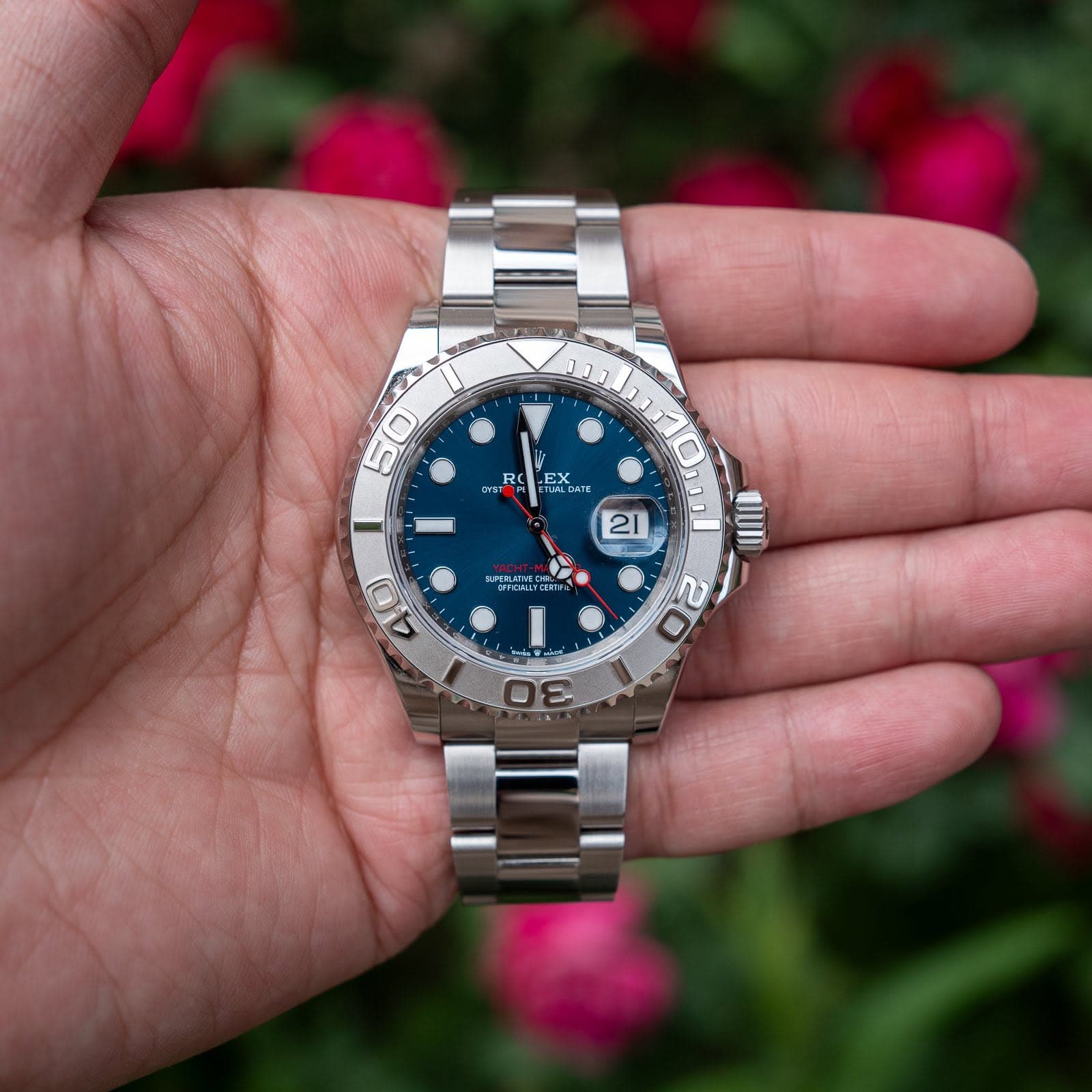 May be an image of wrist watch and text
