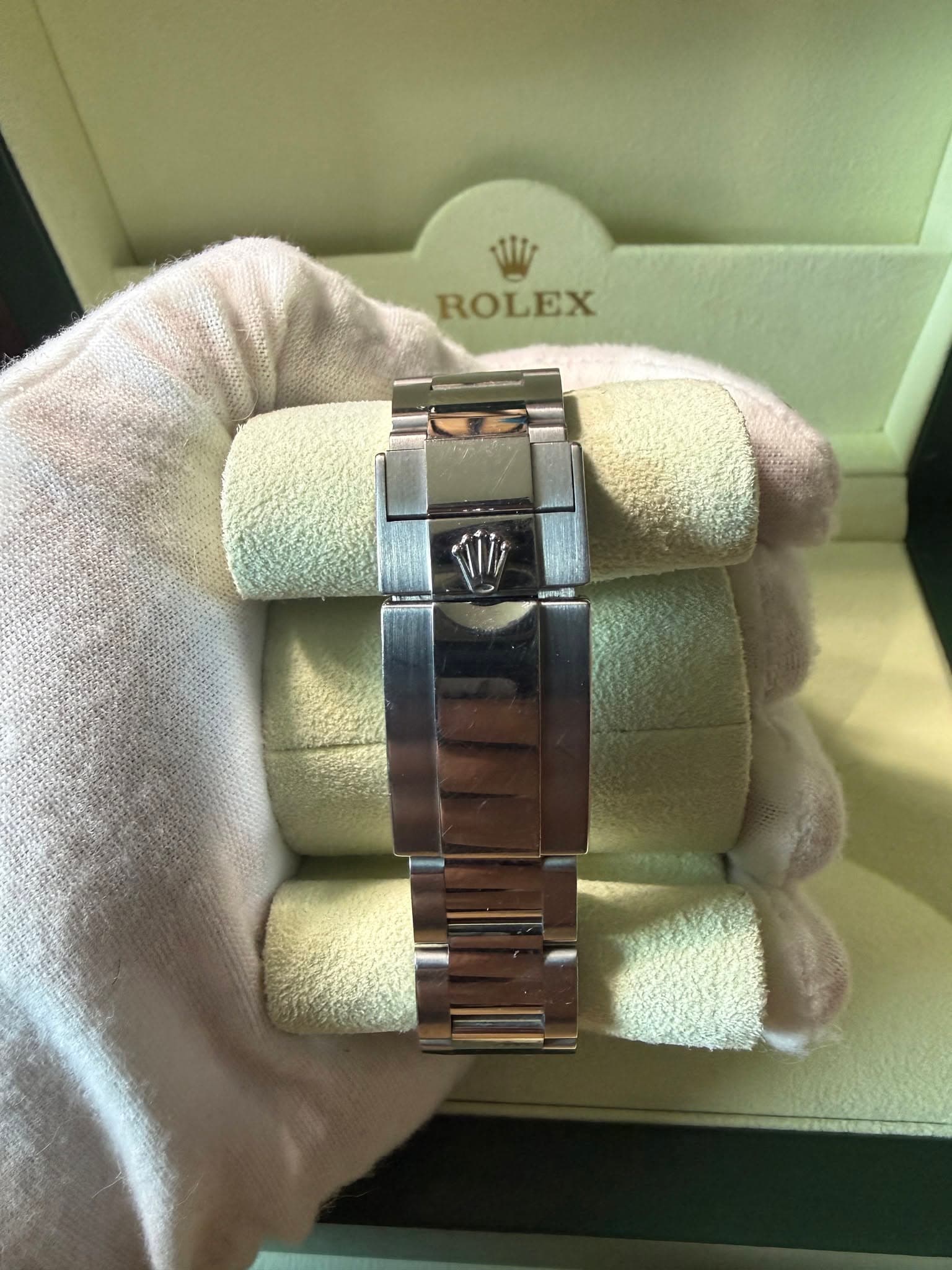 May be an image of wrist watch and text