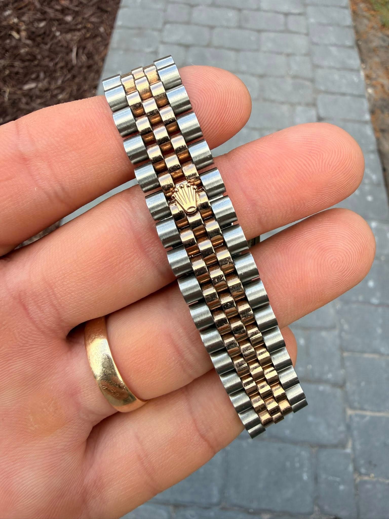 May be an image of wrist watch