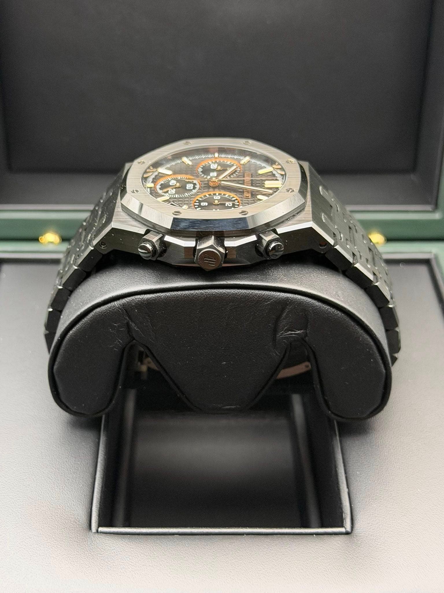 May be an image of wrist watch and text