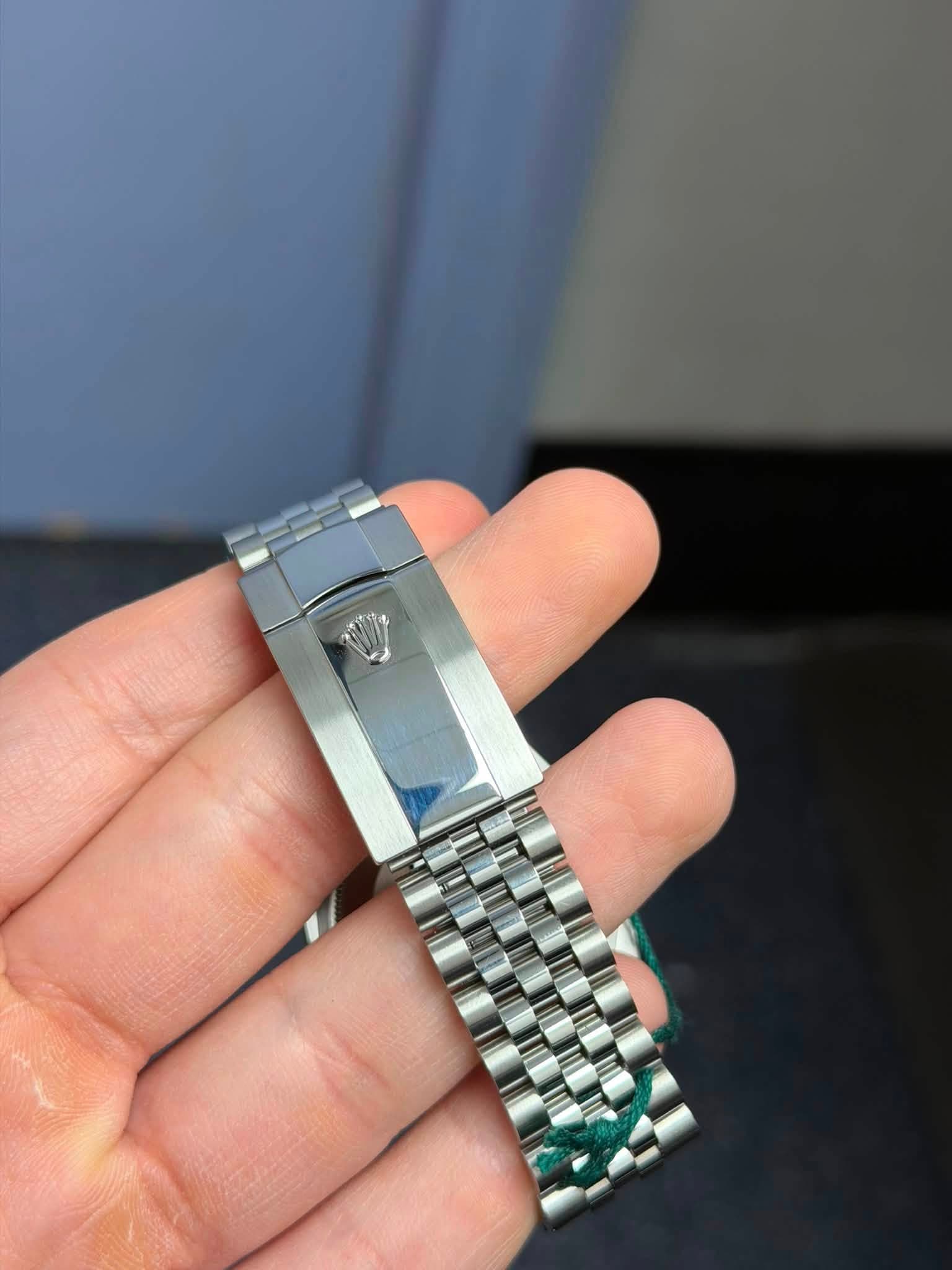 May be an image of wrist watch