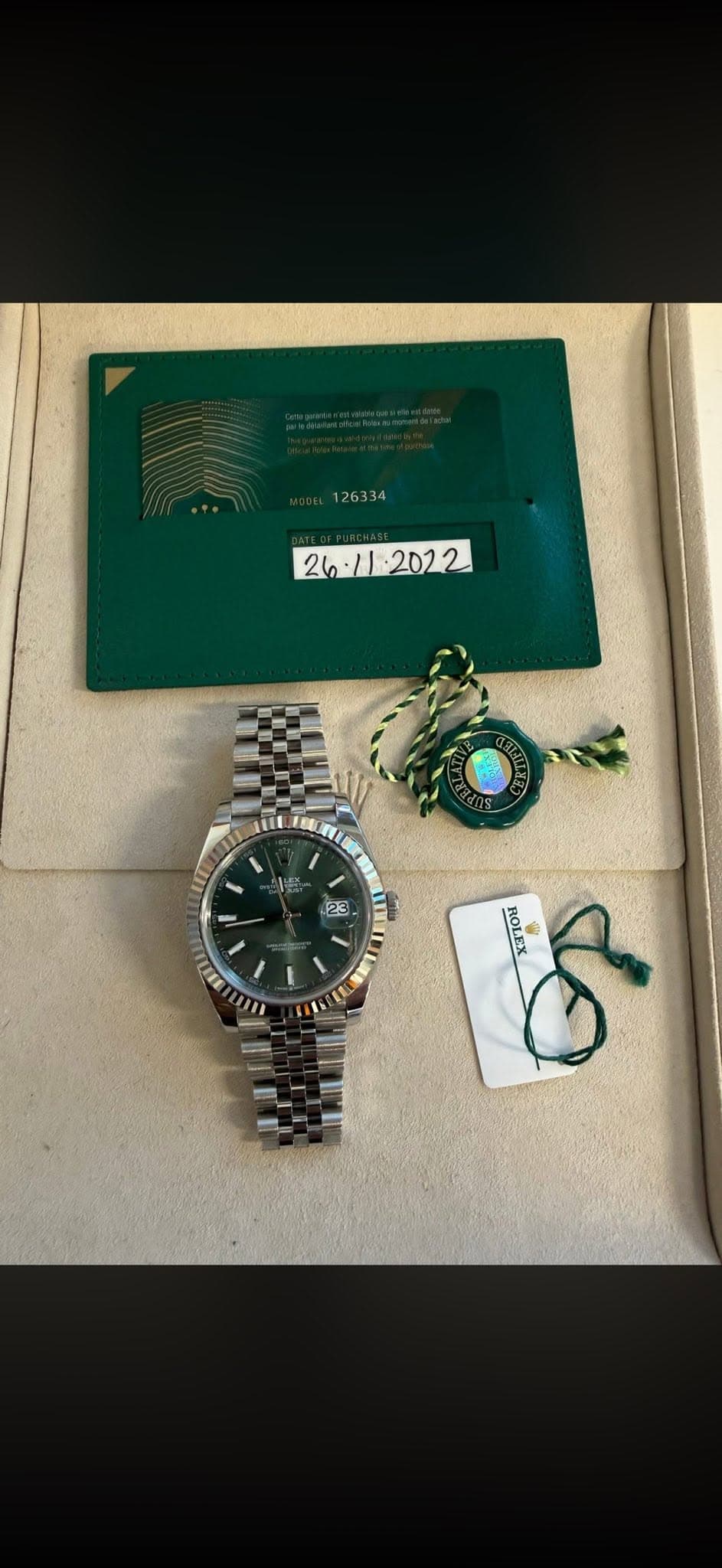 May be an image of wrist watch and text that says ' ሕቶ 23 SU Un ROLEX ROLEX do'
