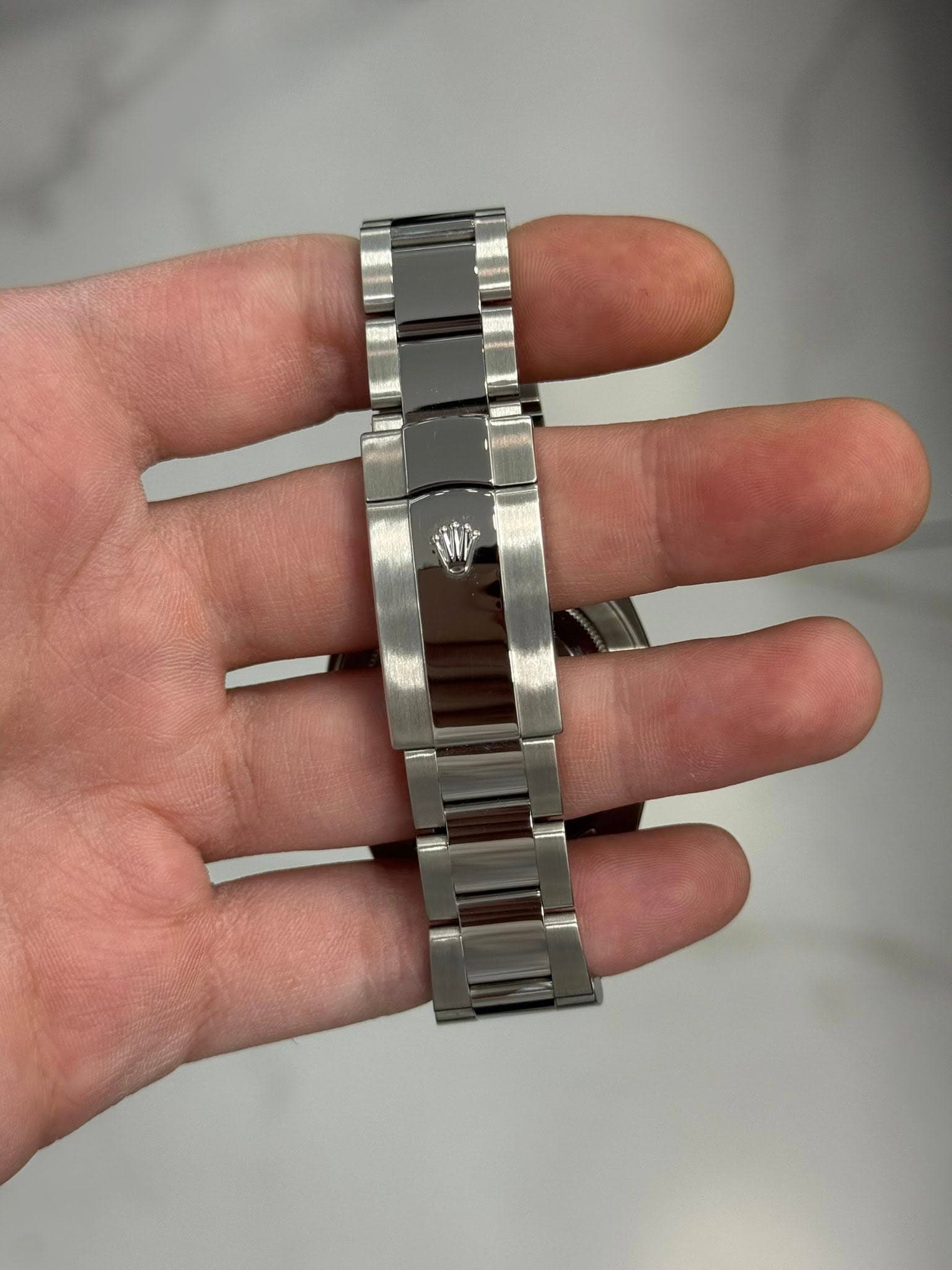 May be an image of wrist watch