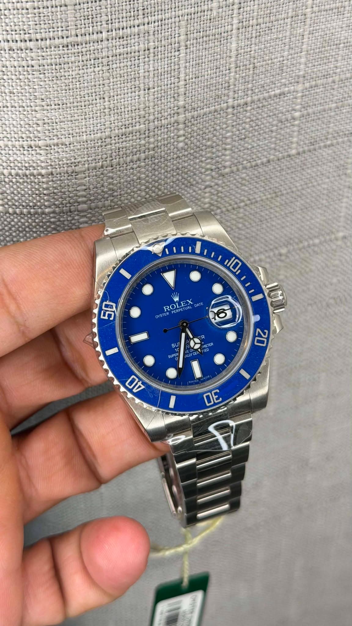 May be an image of wrist watch and text