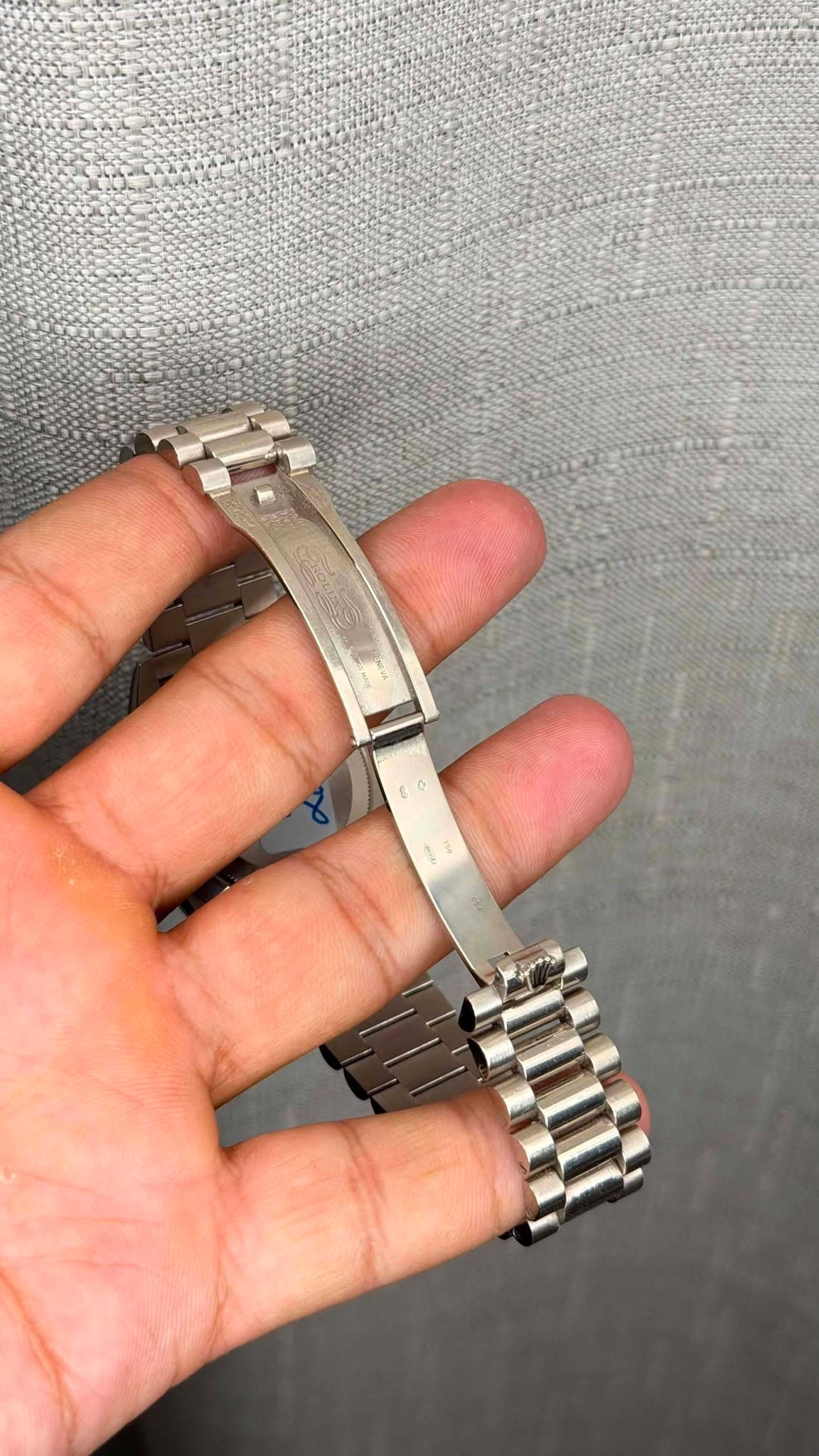 May be an image of wrist watch and text