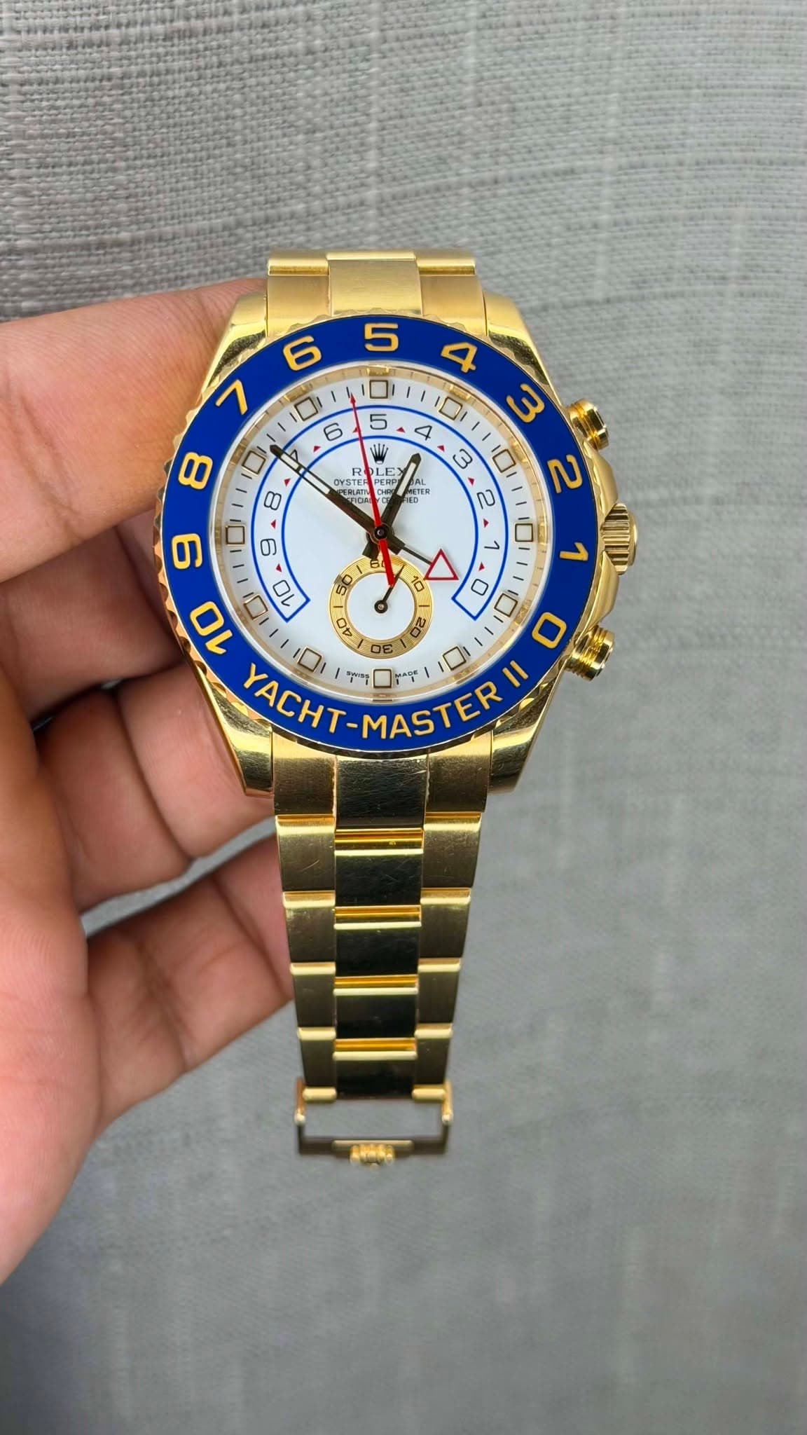 May be an image of wrist watch and text