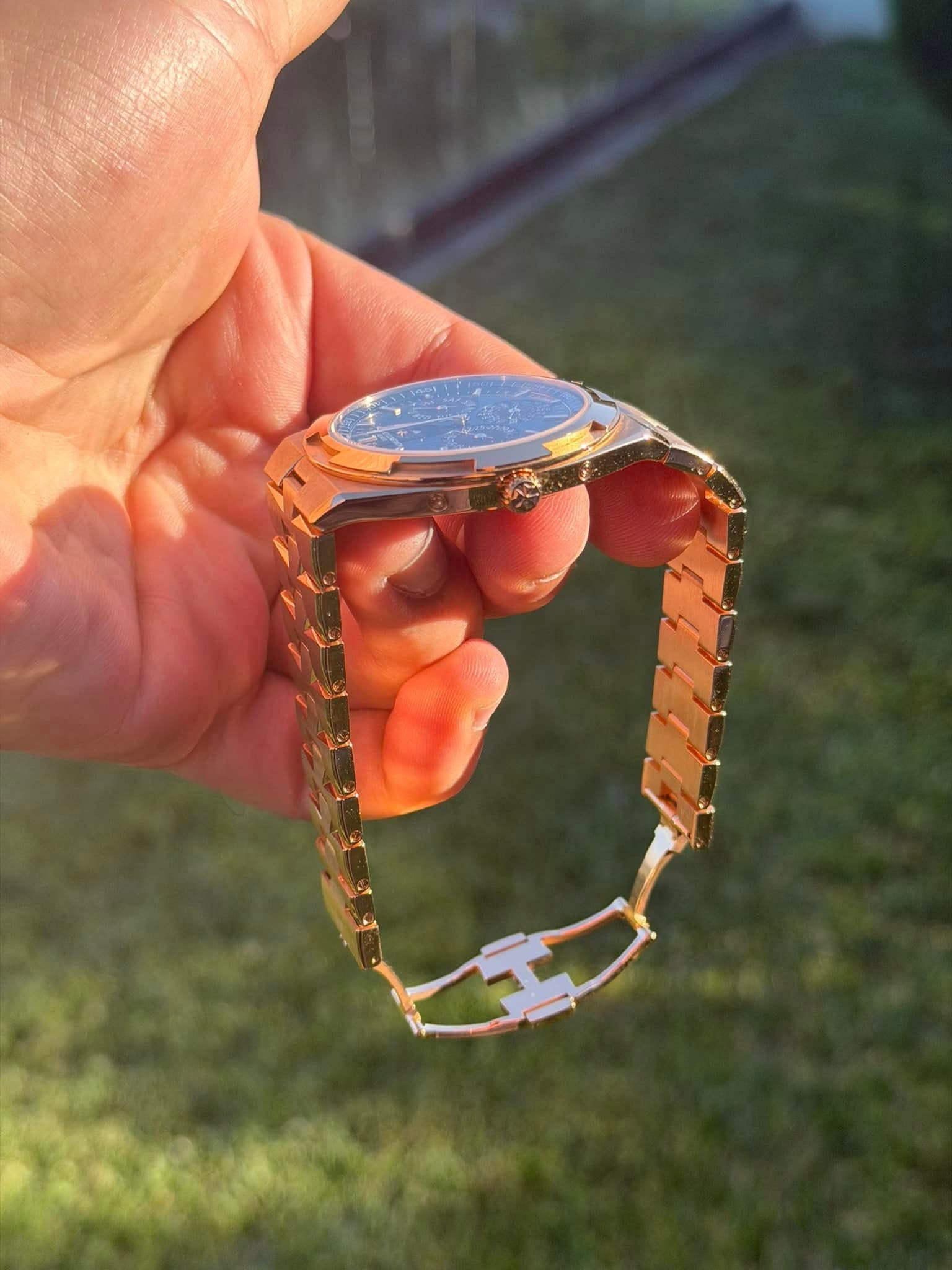 May be an image of wrist watch and jewelry