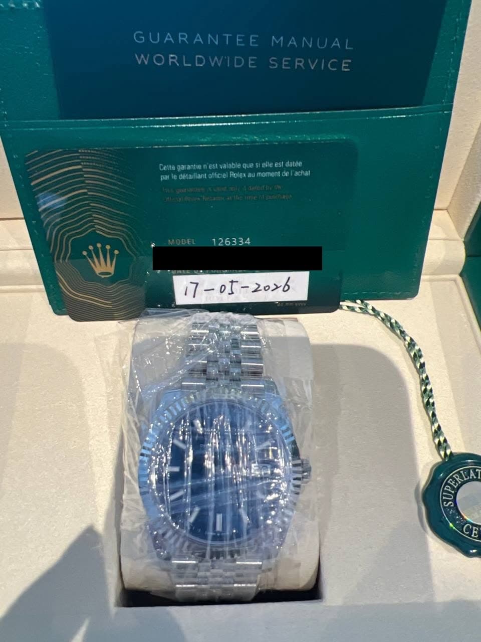 May be an image of digital watch and text