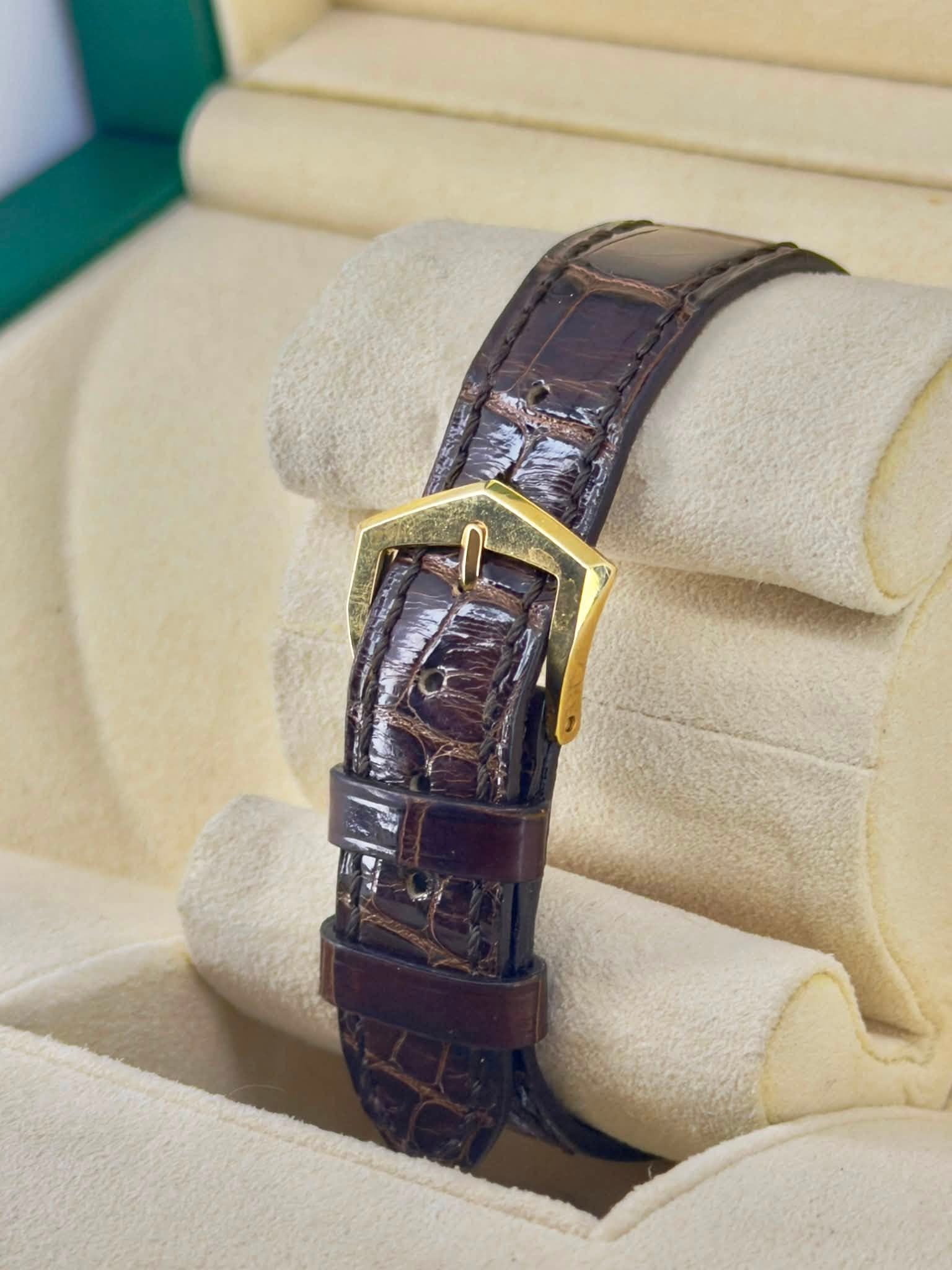 May be an image of wrist watch
