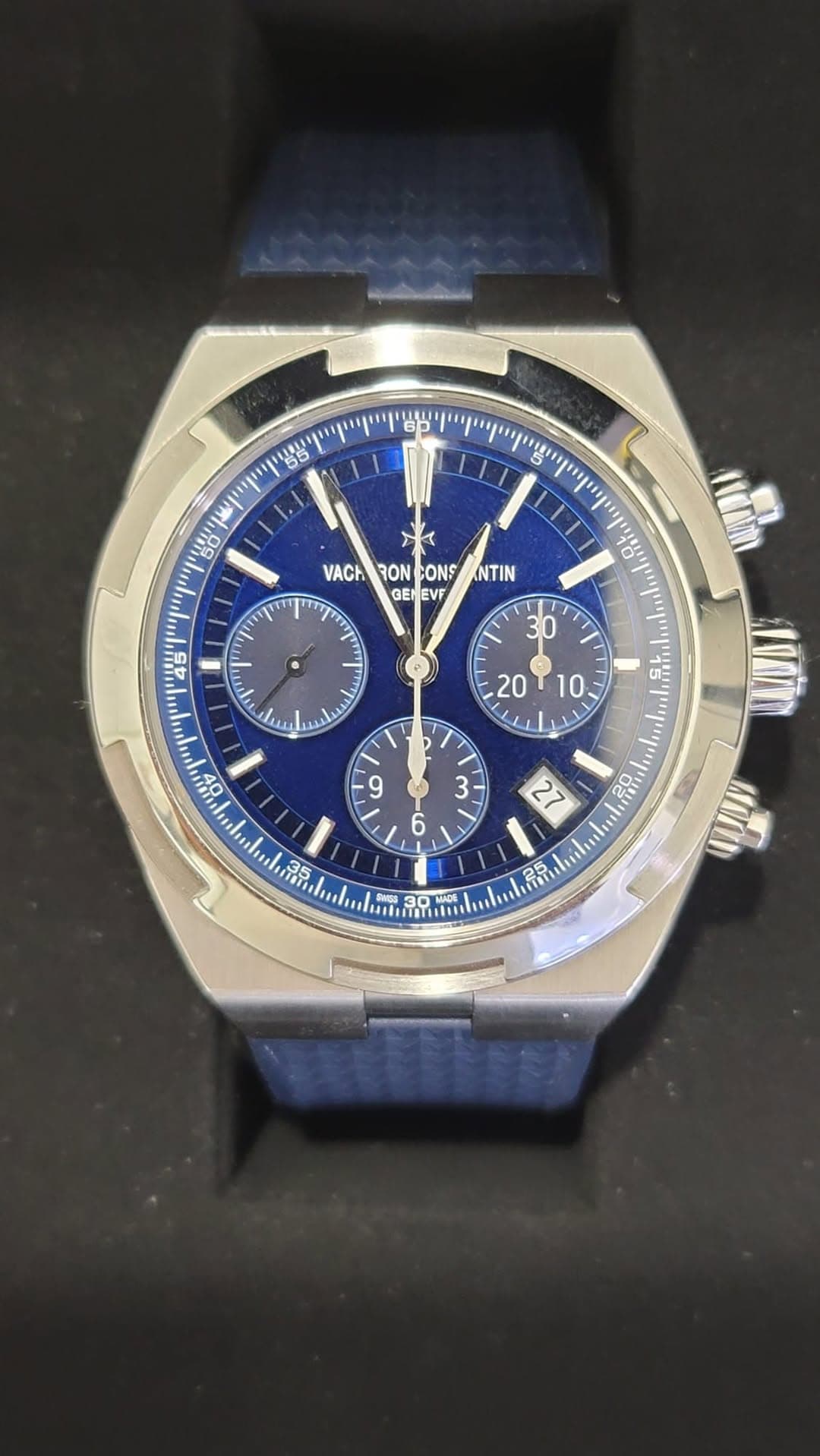 May be an image of wrist watch and text