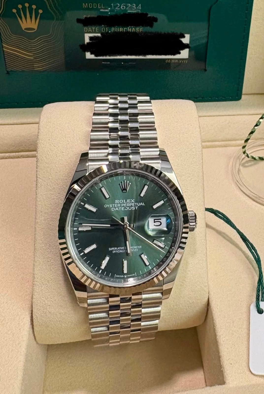 May be an image of wrist watch