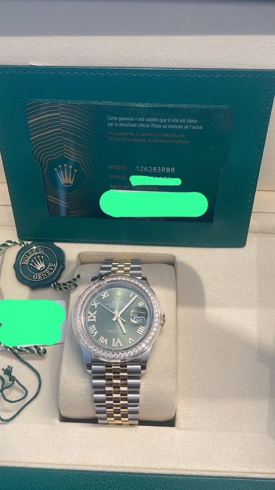 May be an image of wrist watch and text