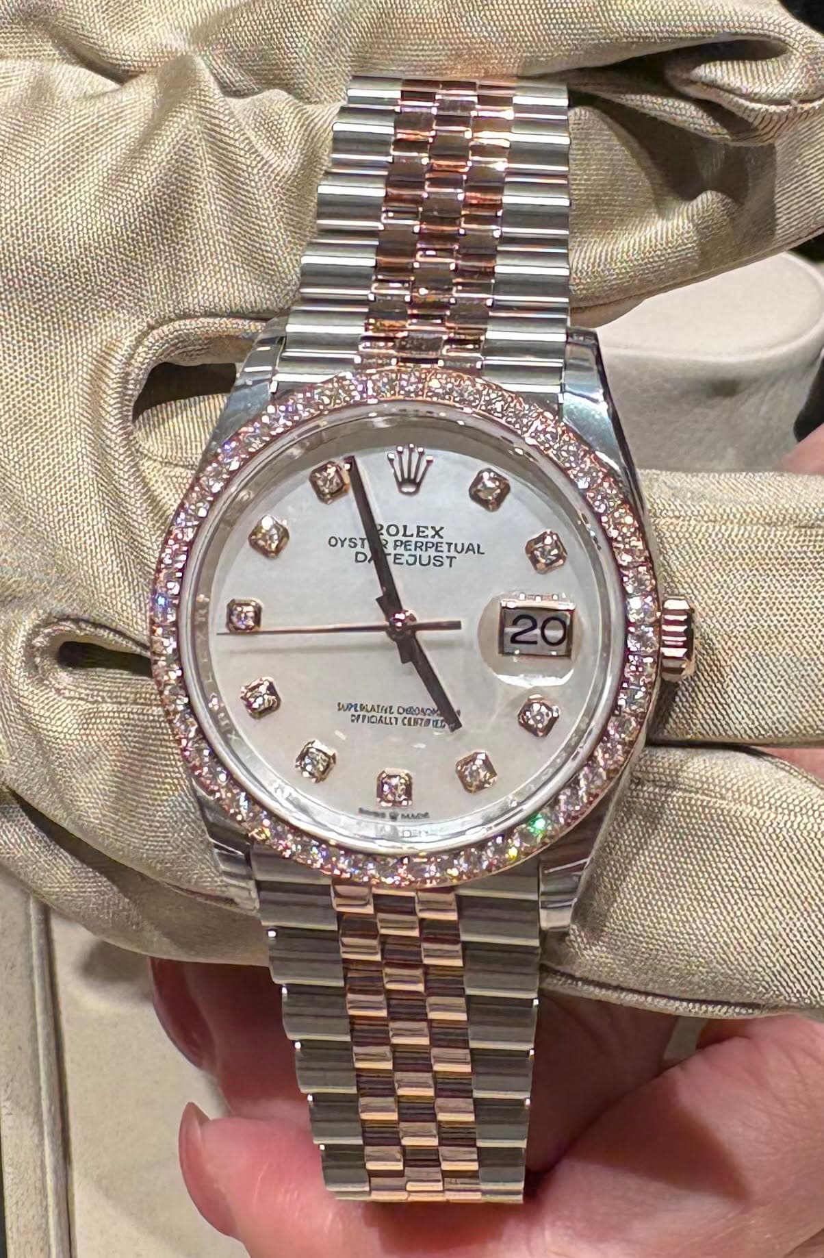May be an image of wrist watch and text