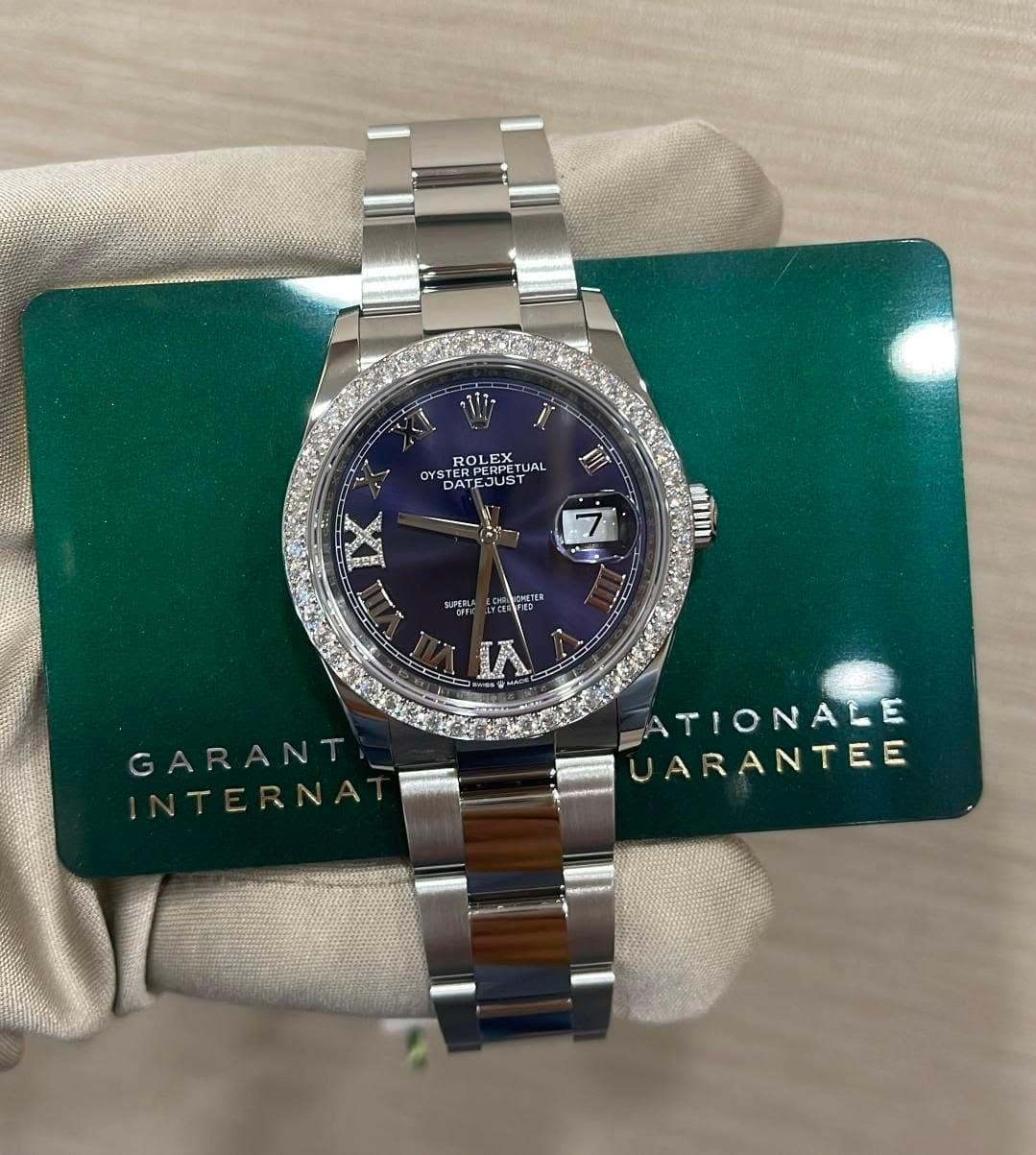 May be an image of wrist watch and text