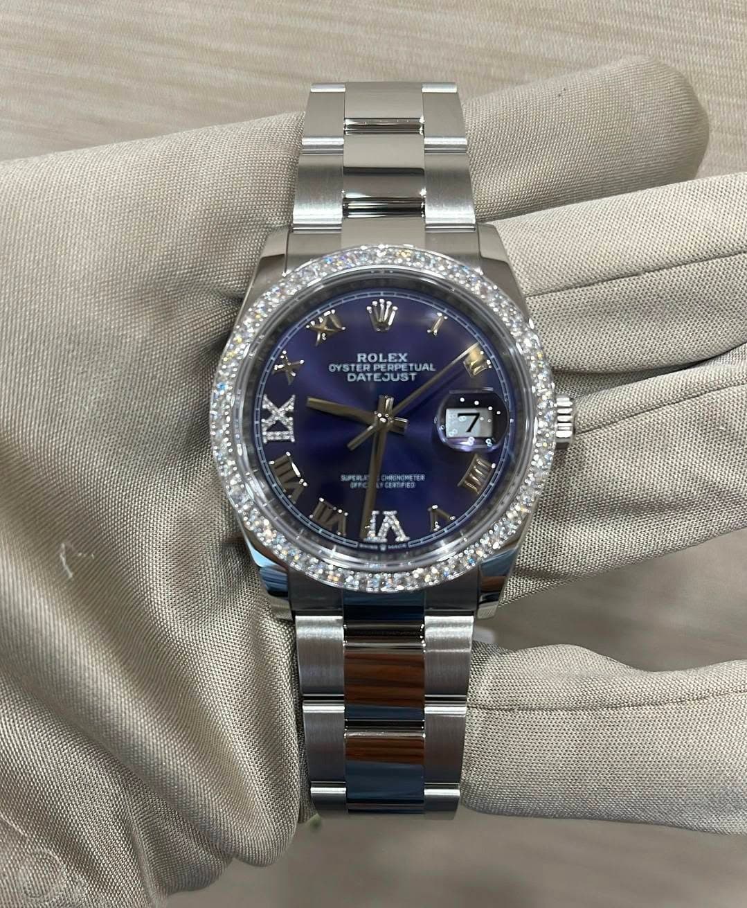 May be an image of wrist watch and text