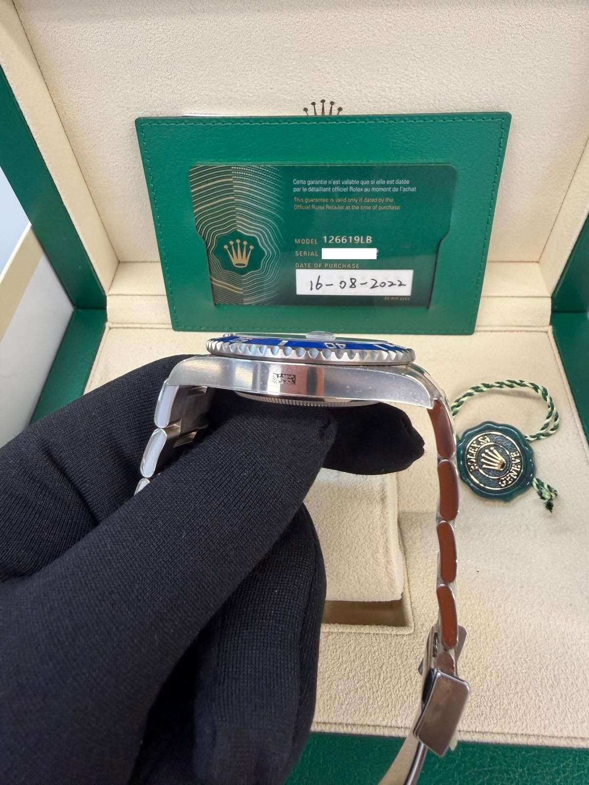 May be an image of wrist watch and text