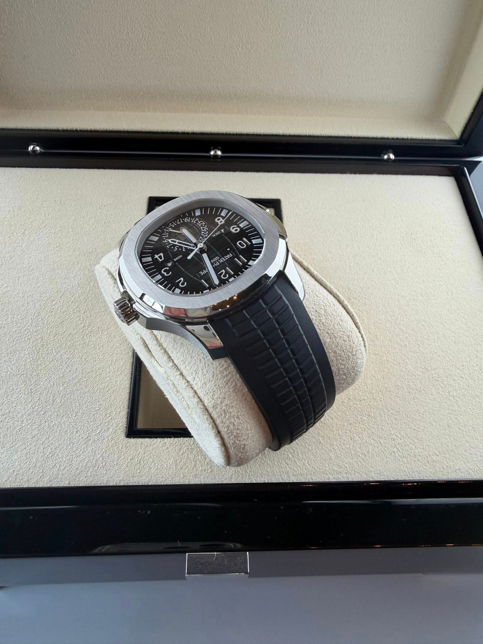 May be an image of wrist watch and text