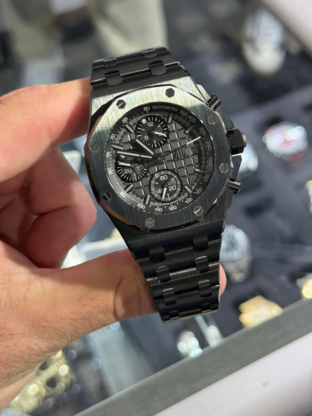 May be an image of wrist watch and text