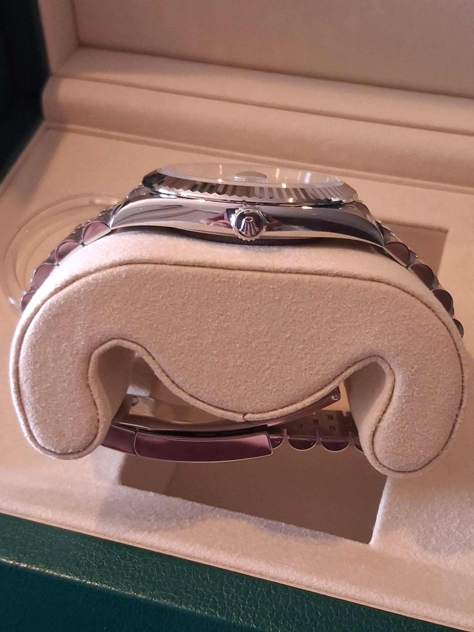 May be an image of wrist watch and ring