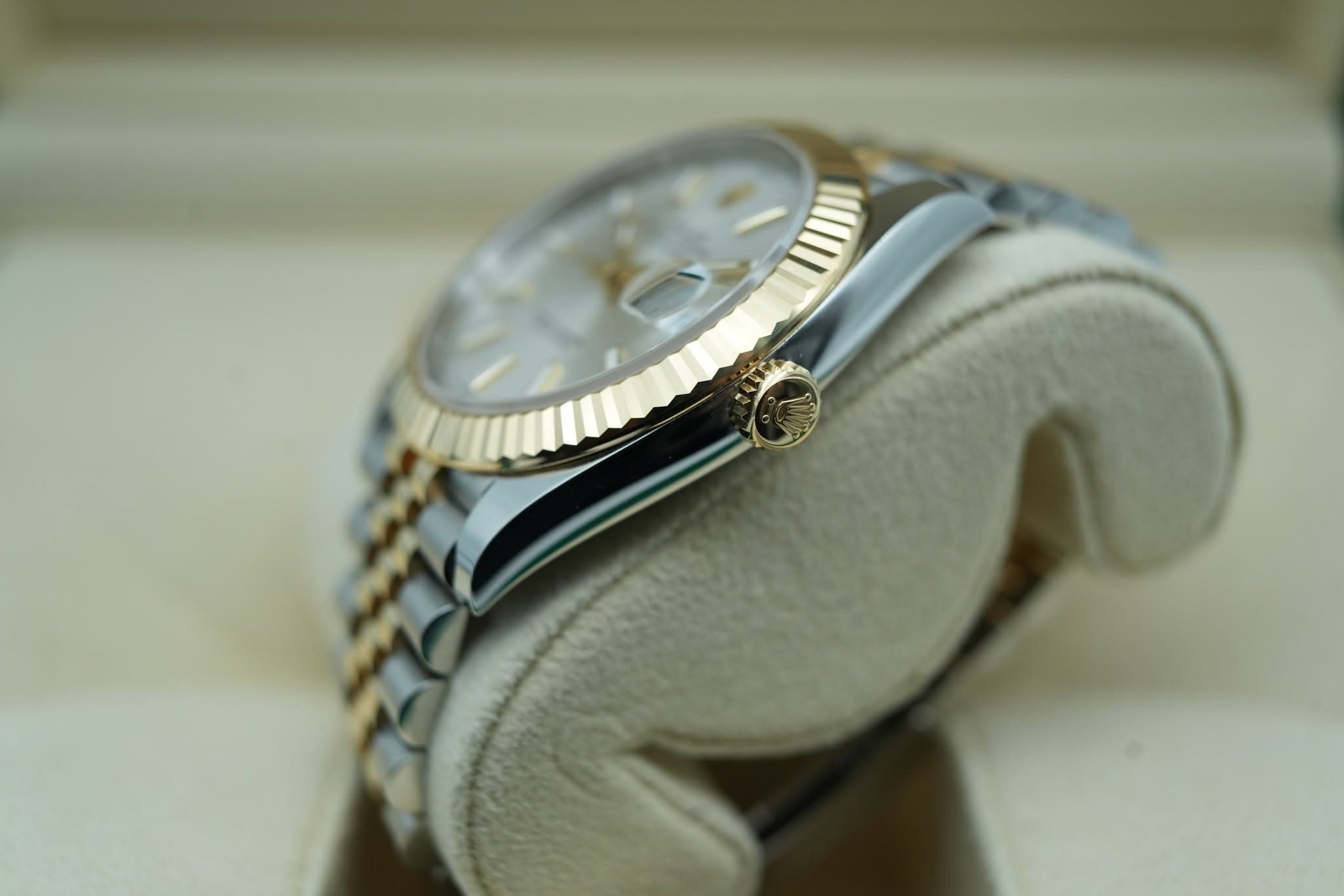 May be an image of wrist watch and text