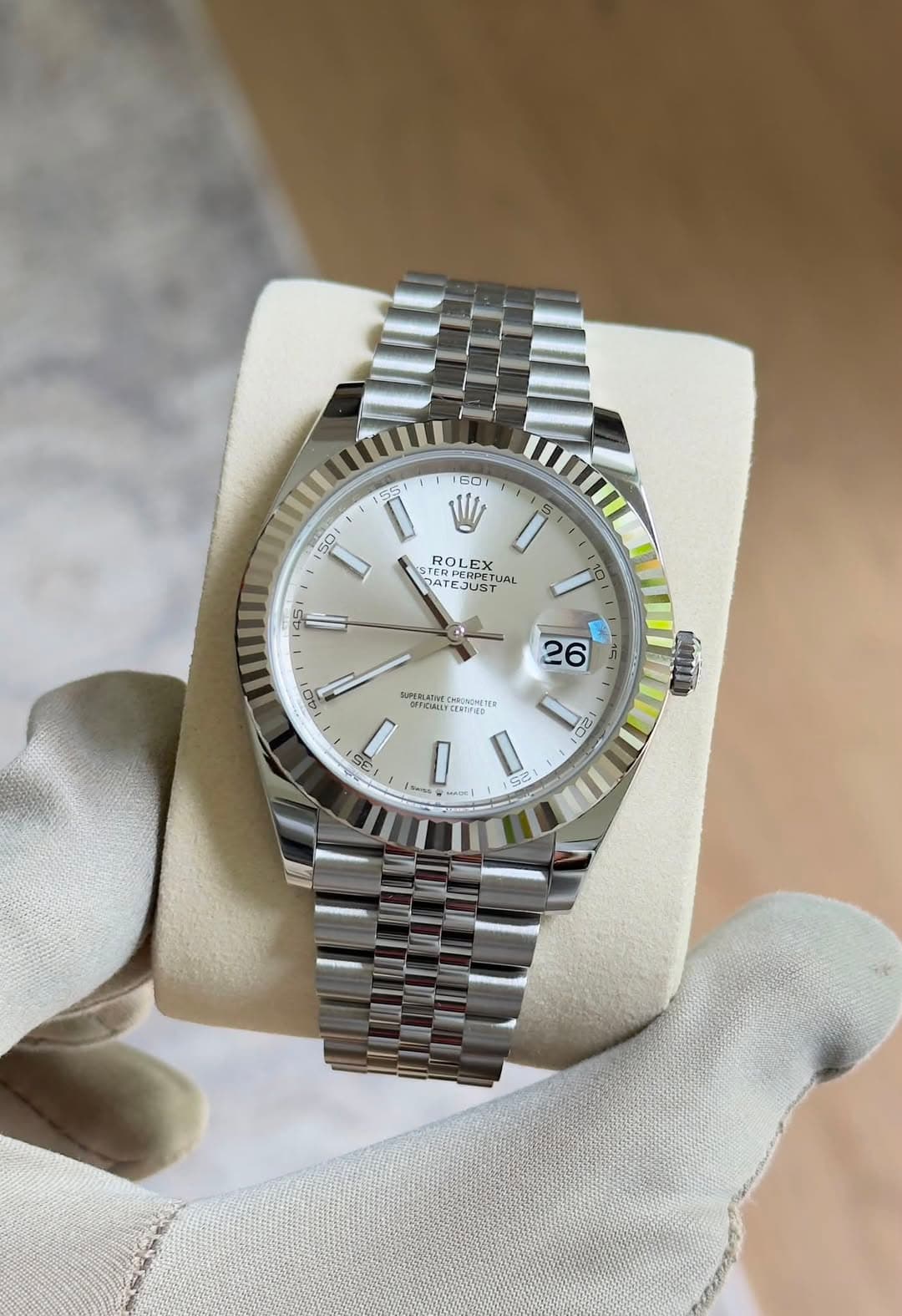 May be an image of wrist watch and text