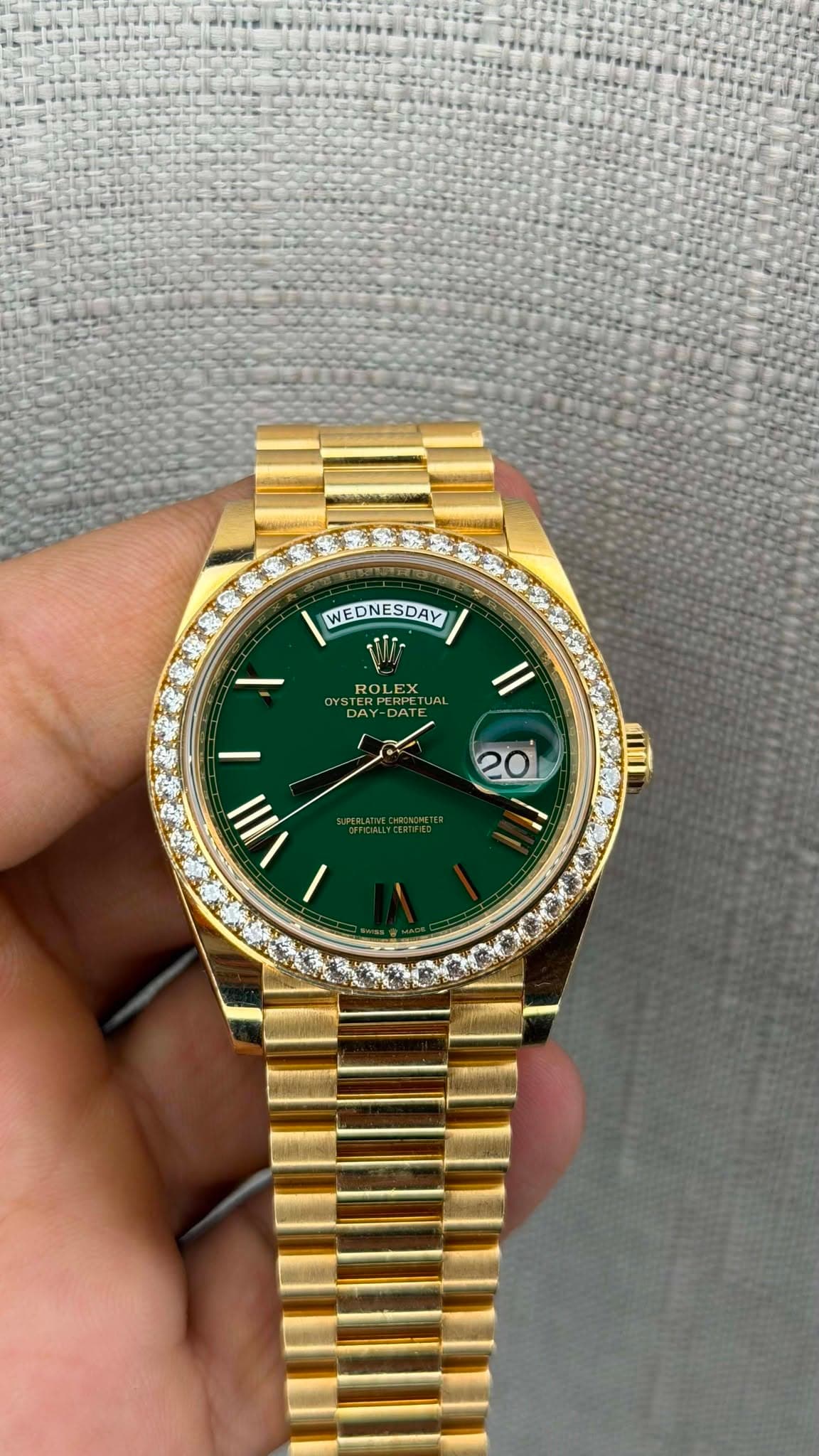 May be an image of wrist watch and text