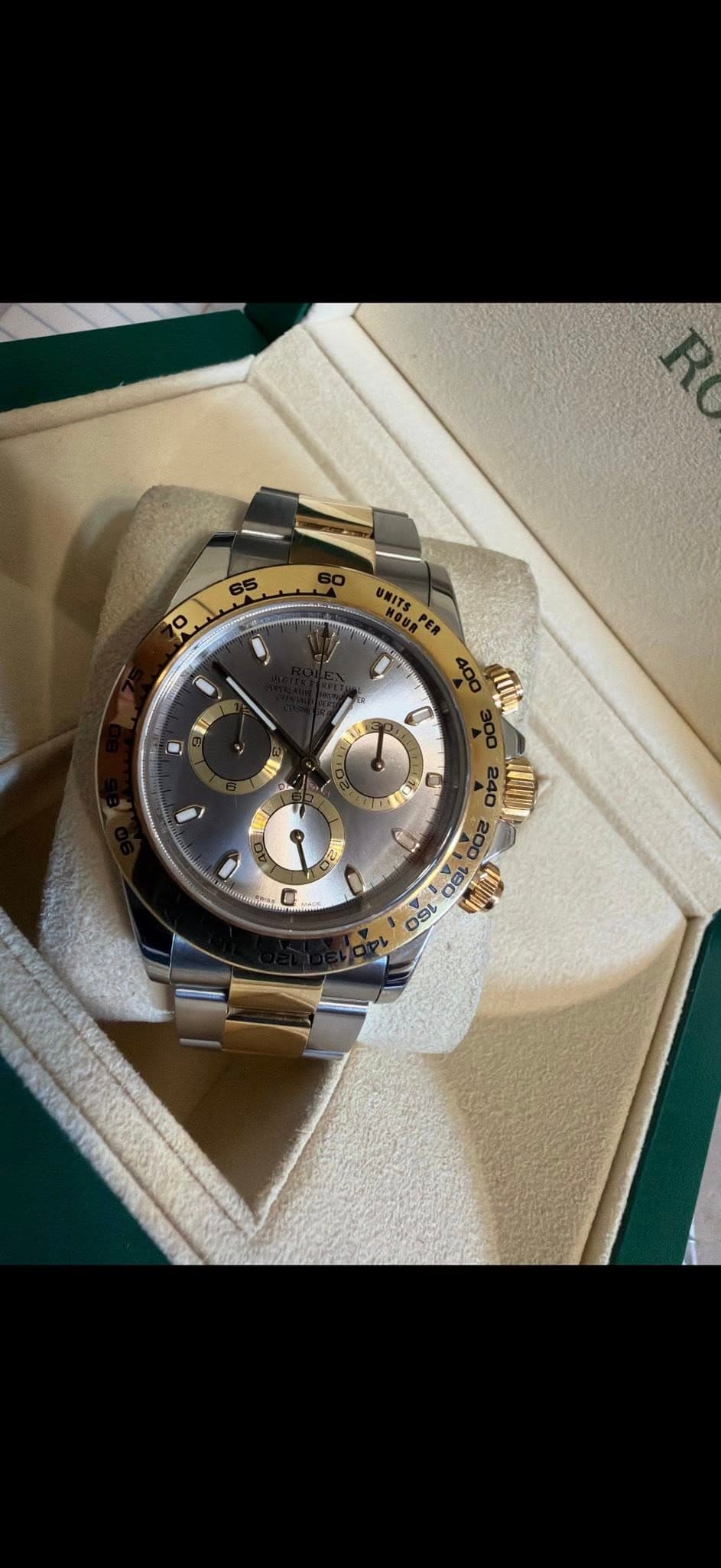 May be an image of wrist watch and text
