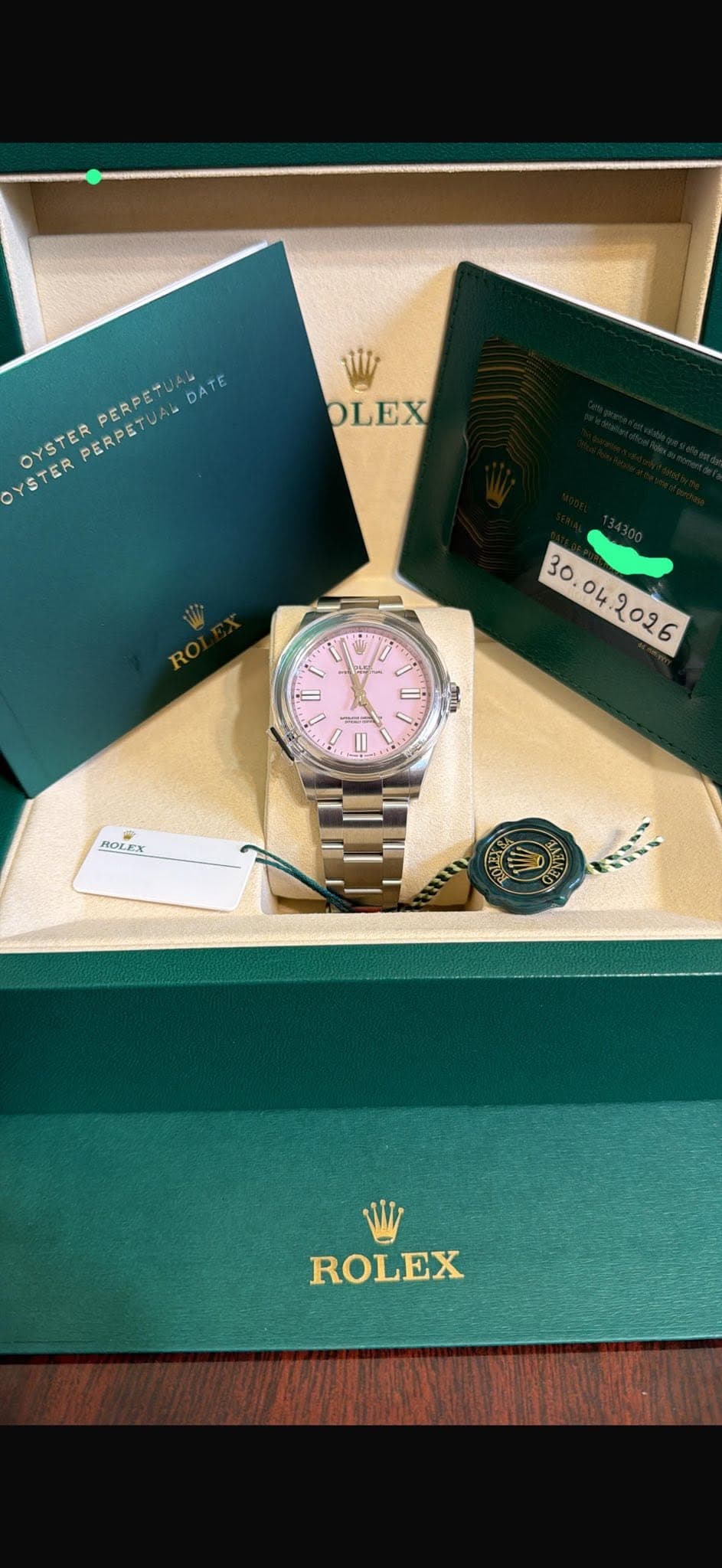 May be an image of wrist watch and text