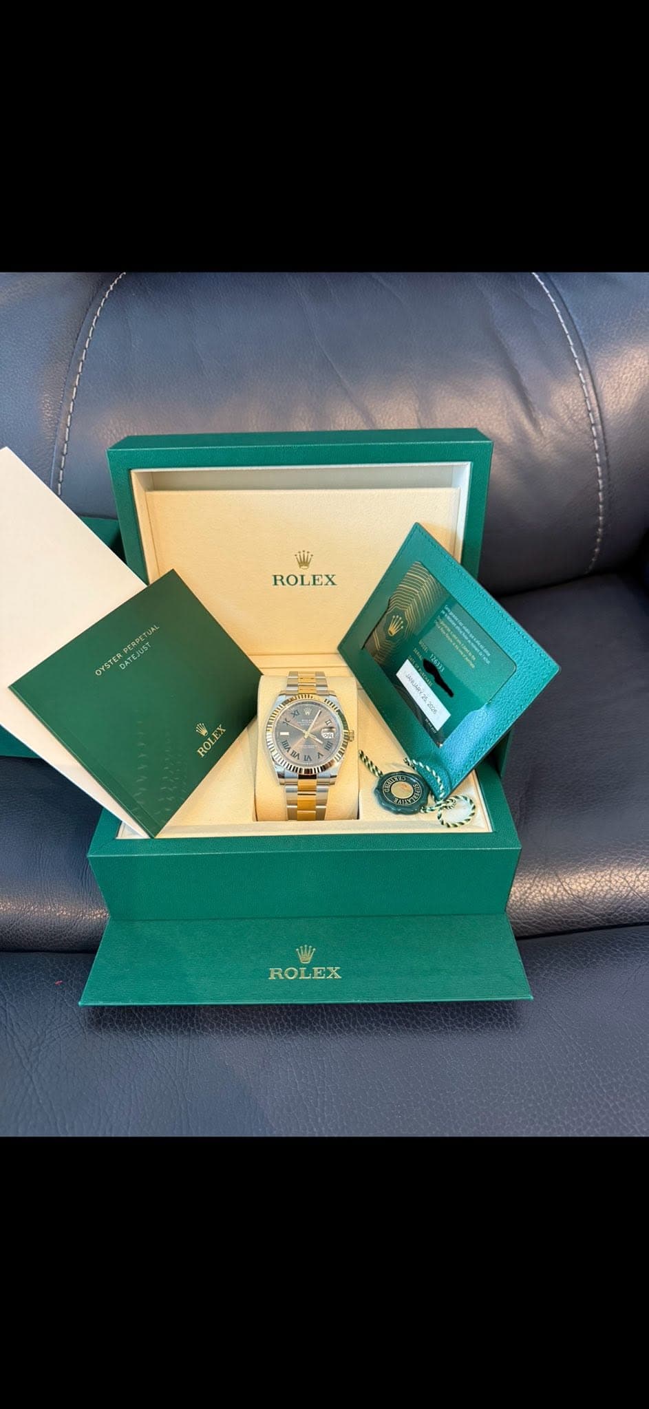 May be an image of wrist watch and text