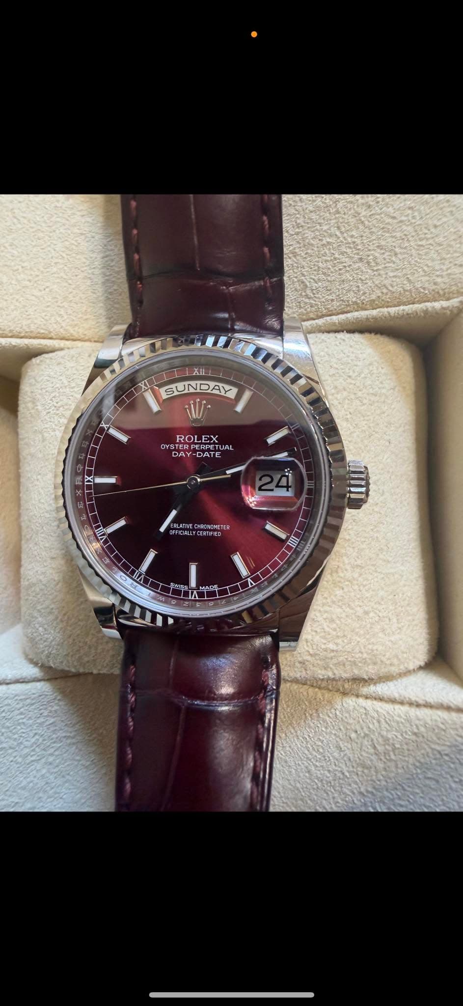 May be an image of wrist watch and text
