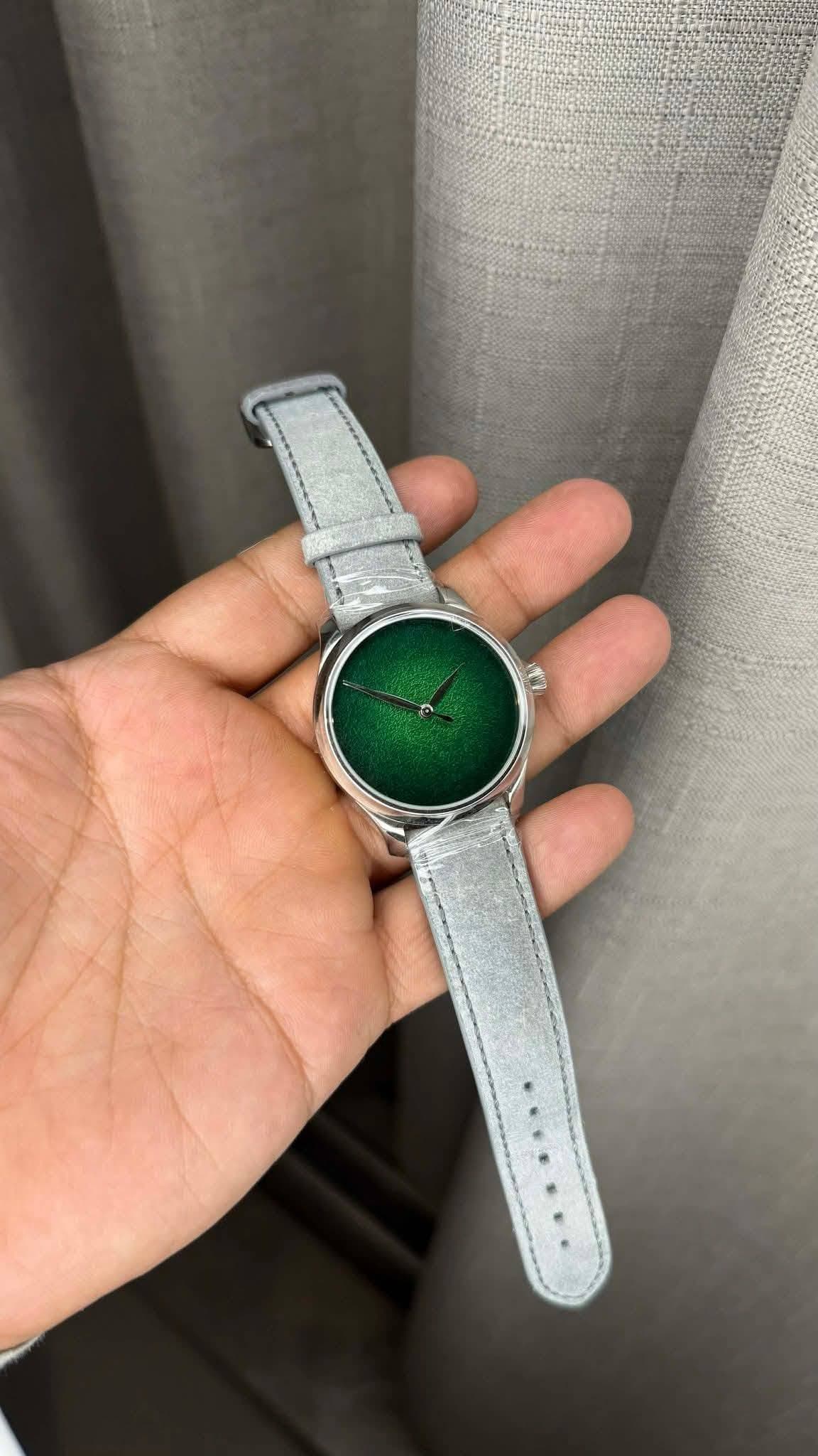 May be an image of wrist watch
