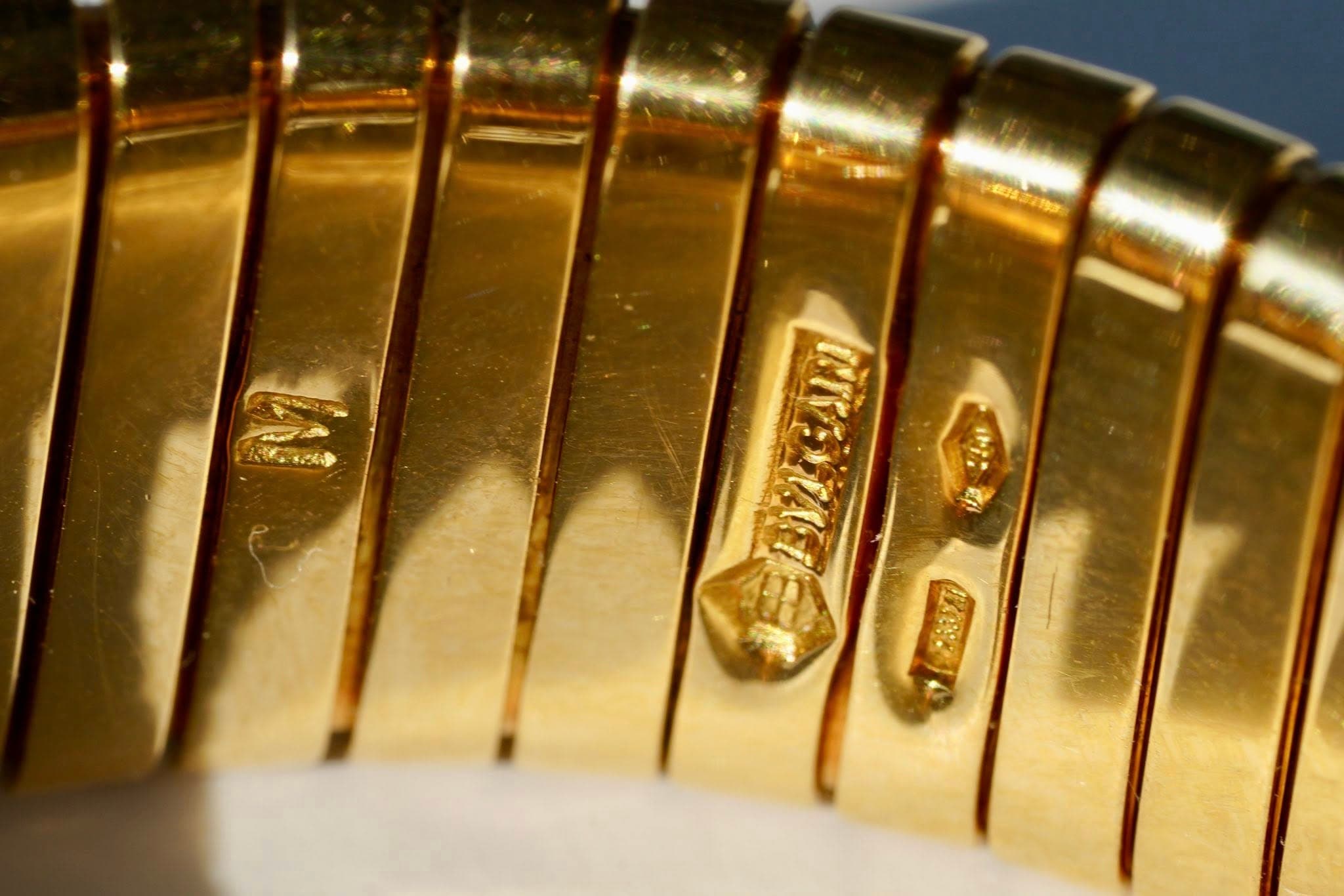 May be an image of jewelry and text