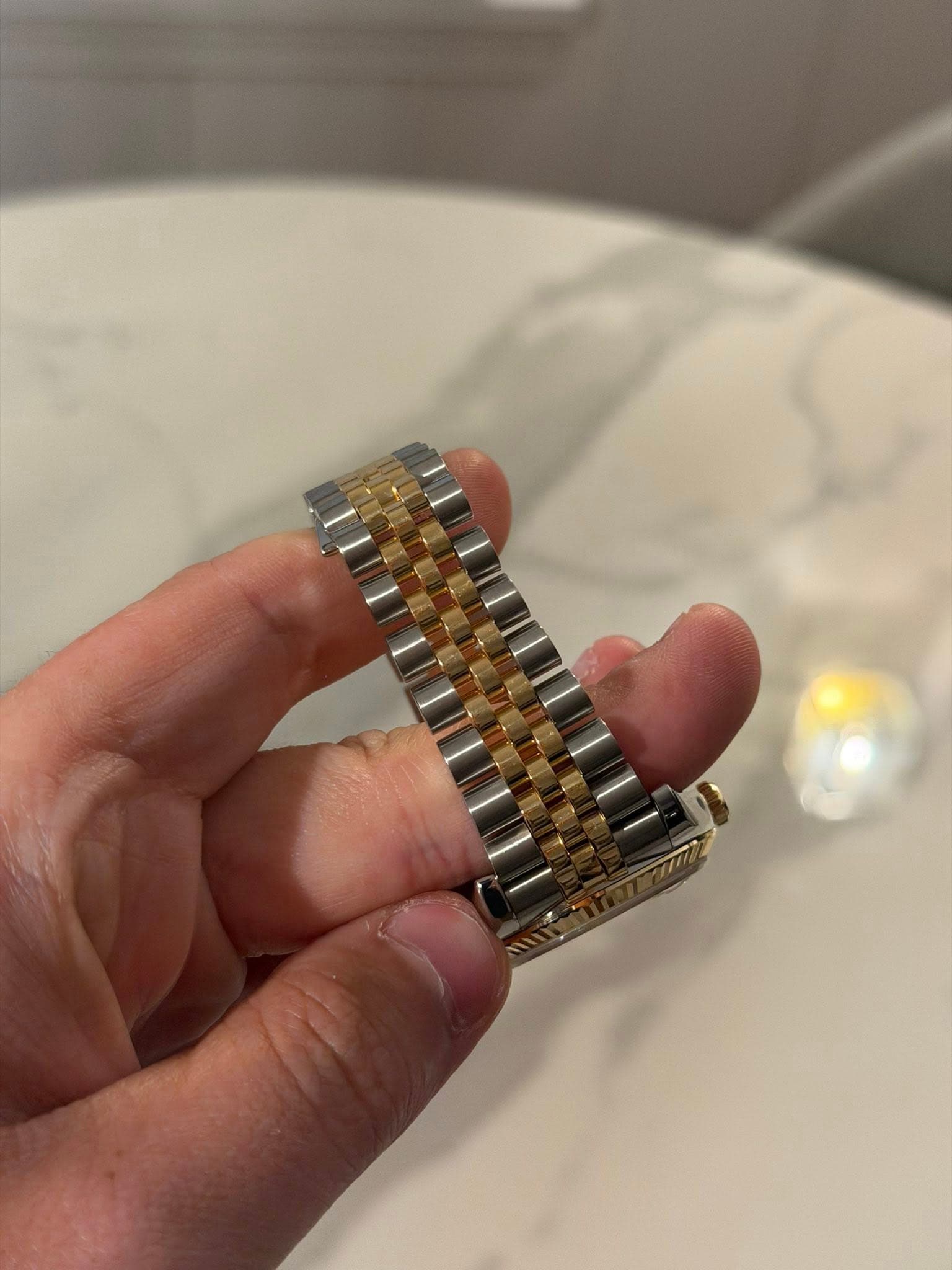 May be an image of wrist watch