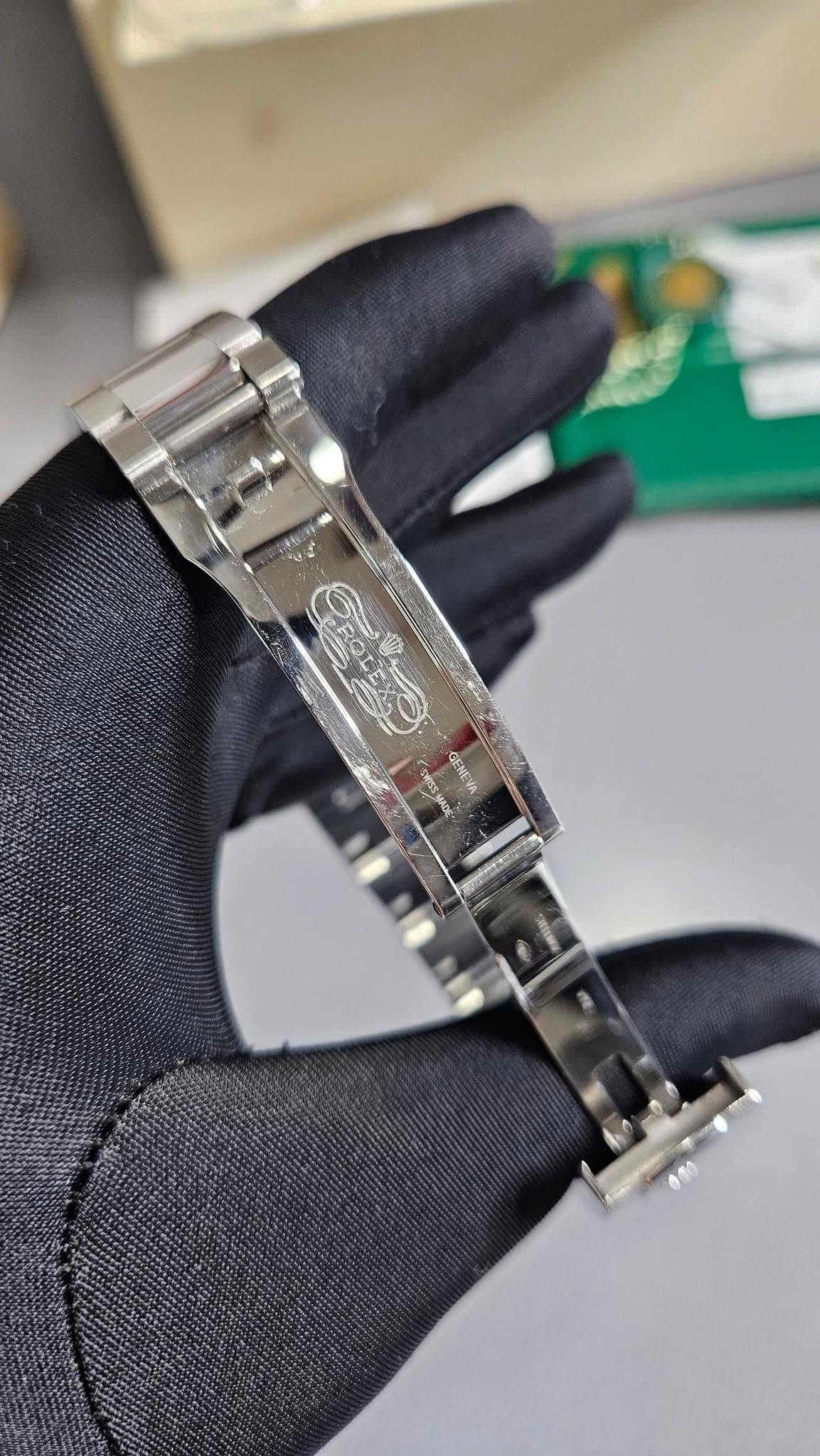 May be an image of wrist watch and text