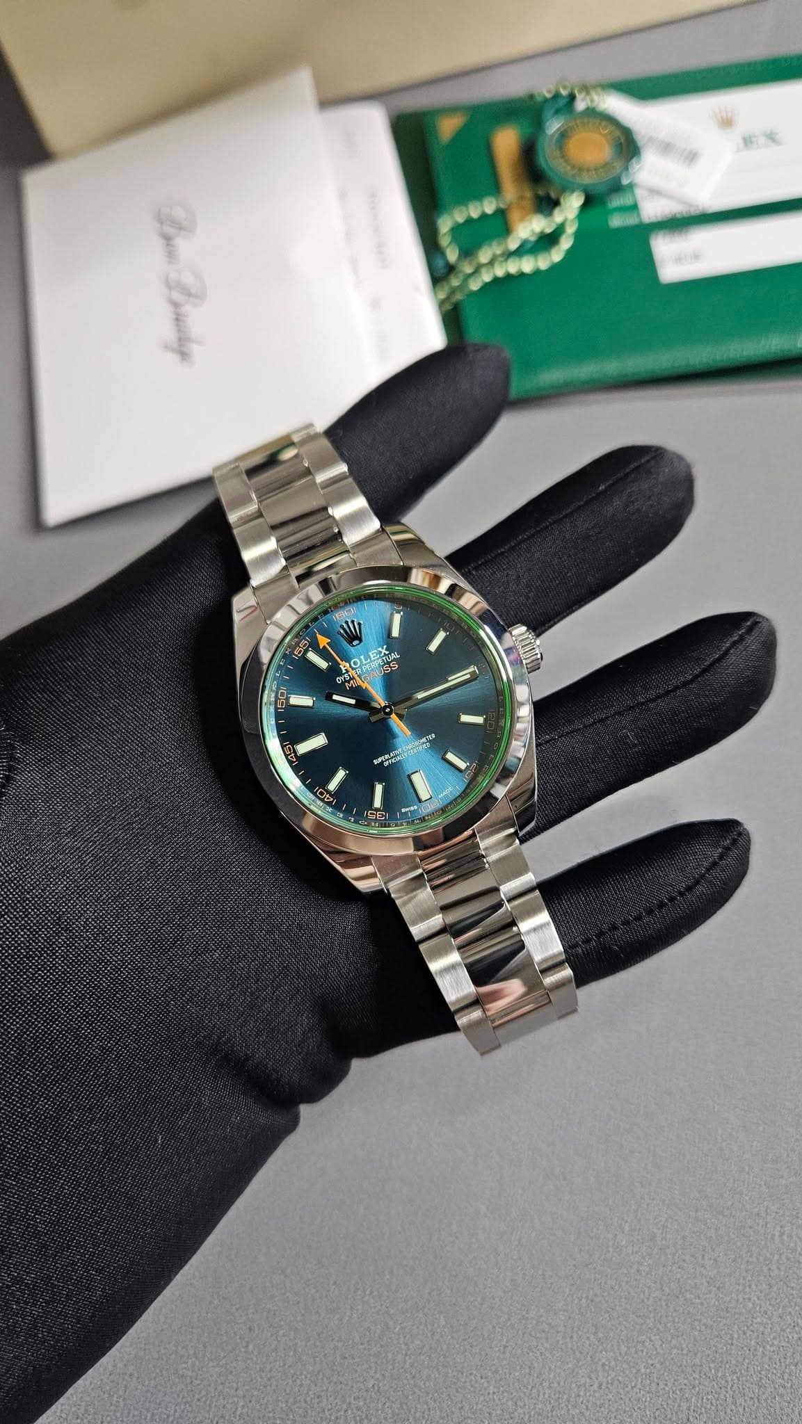 May be an image of wrist watch and text