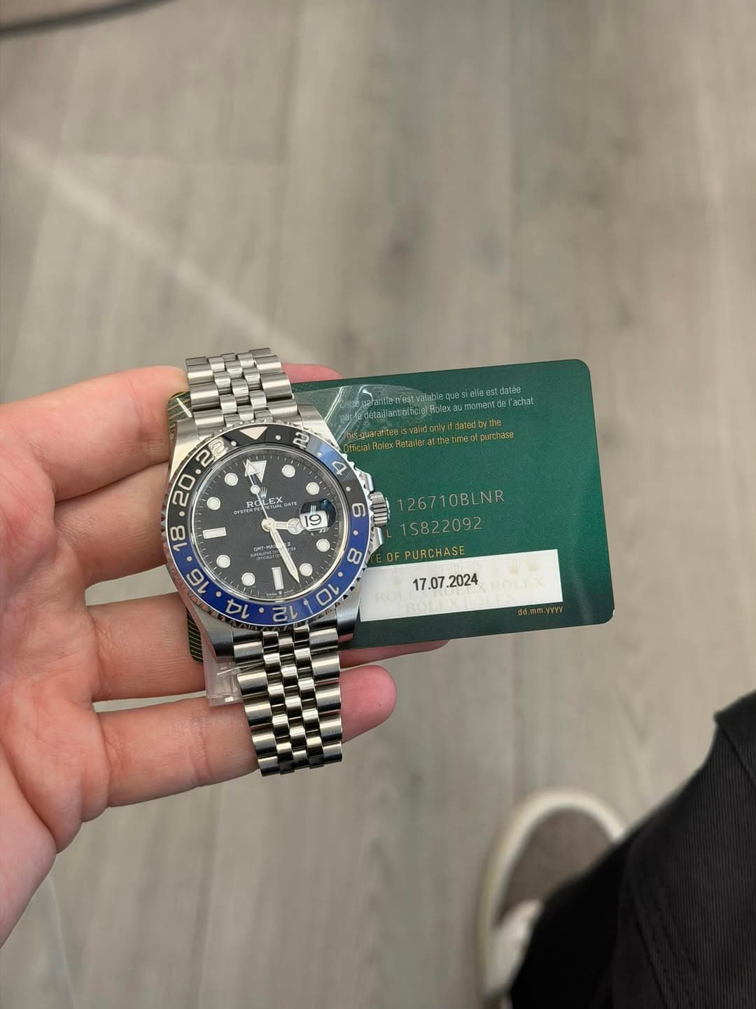 May be an image of wrist watch and text