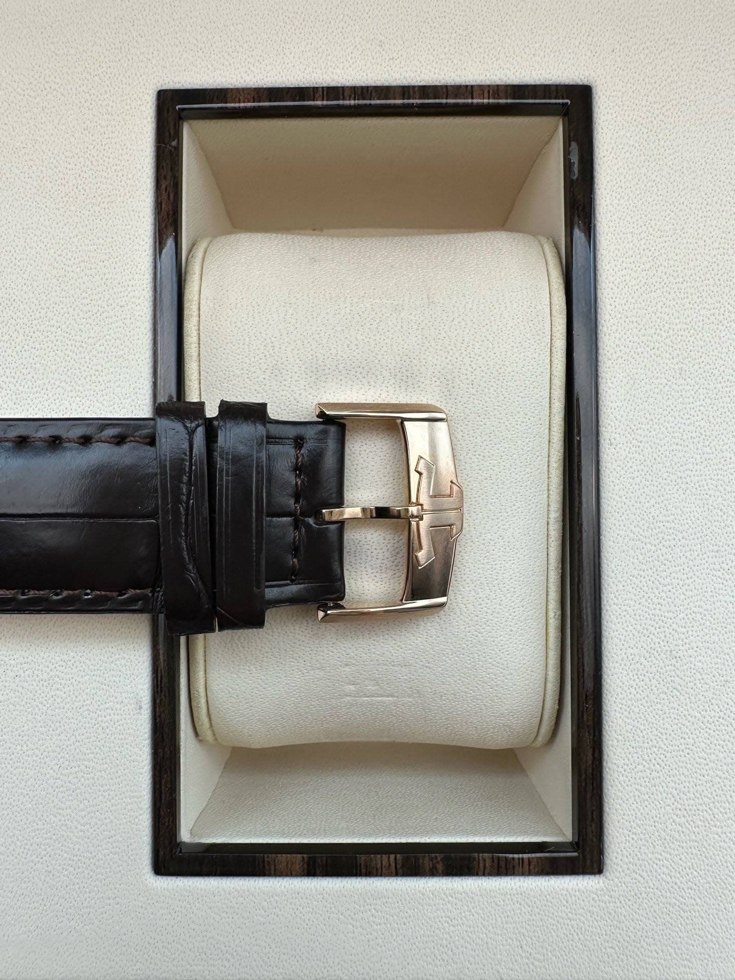 May be an image of leather and wrist watch
