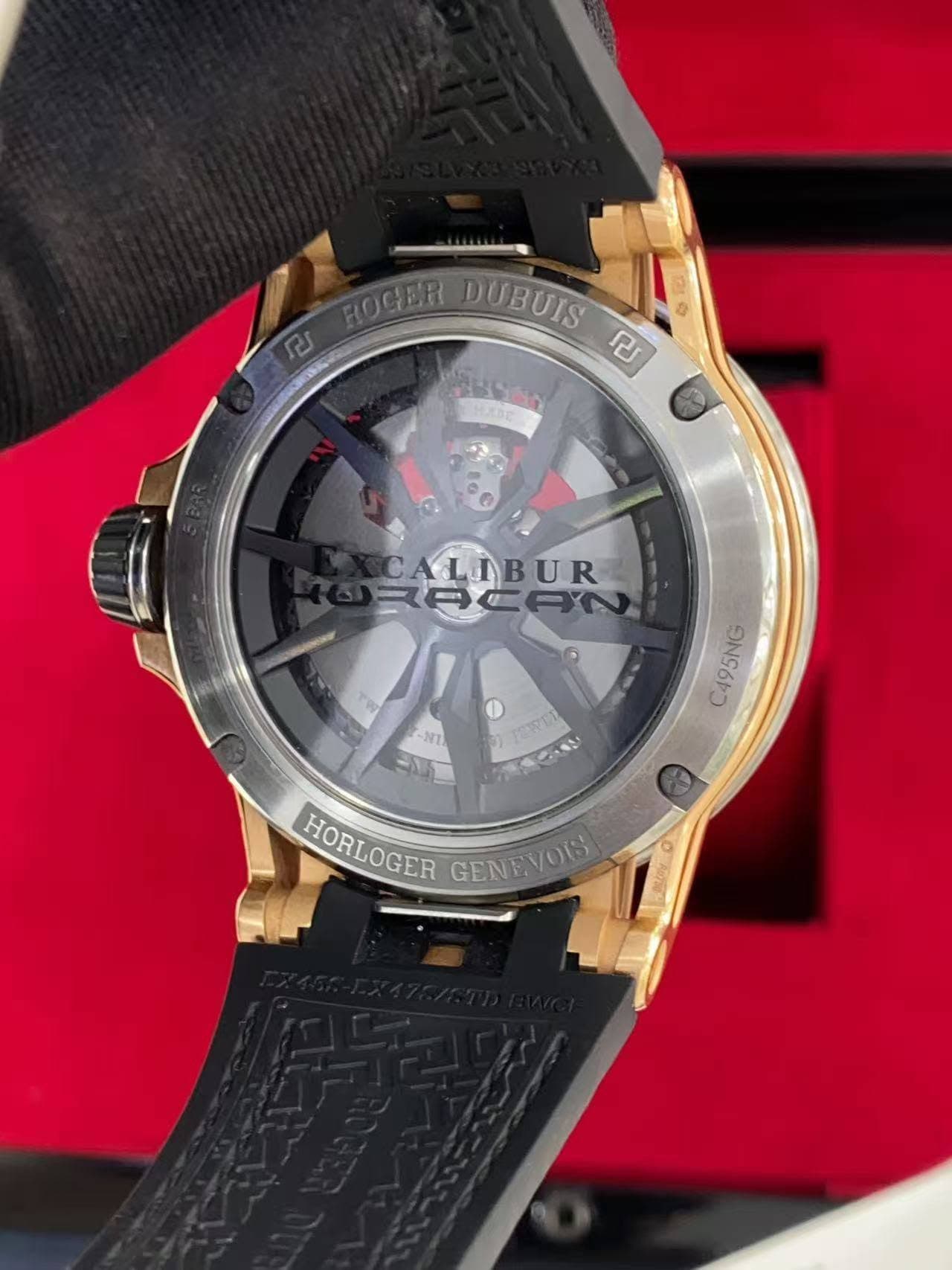 May be an image of wrist watch and text