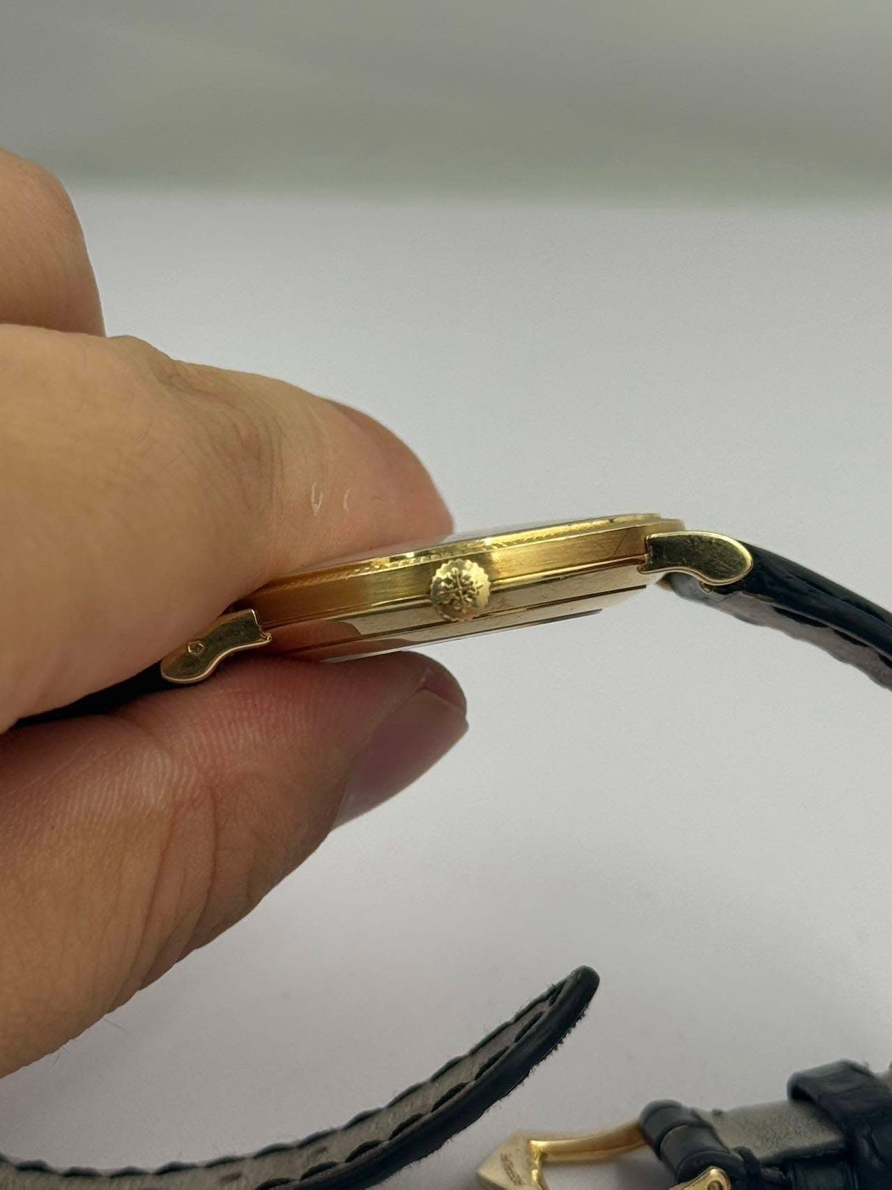 May be an image of leather, jewelry and brass