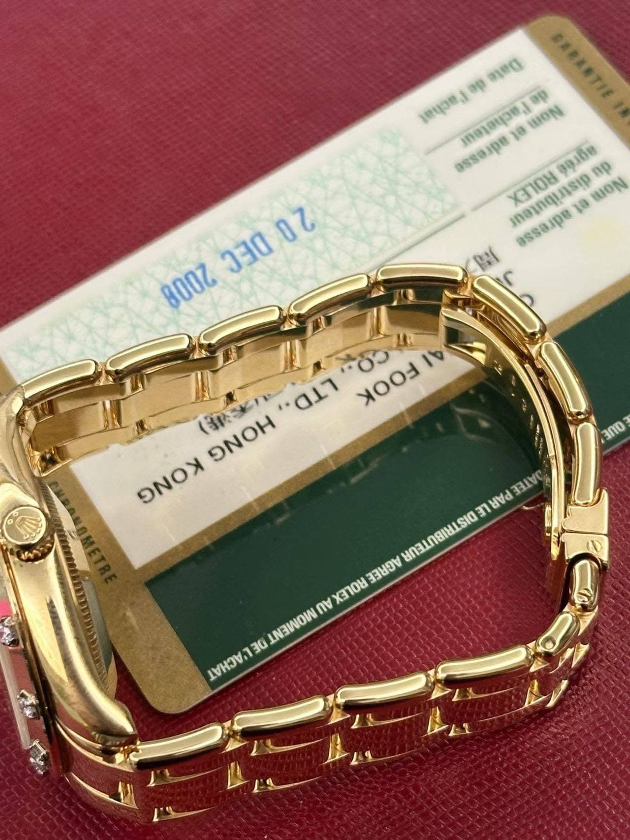May be an image of jewelry, wrist watch and text