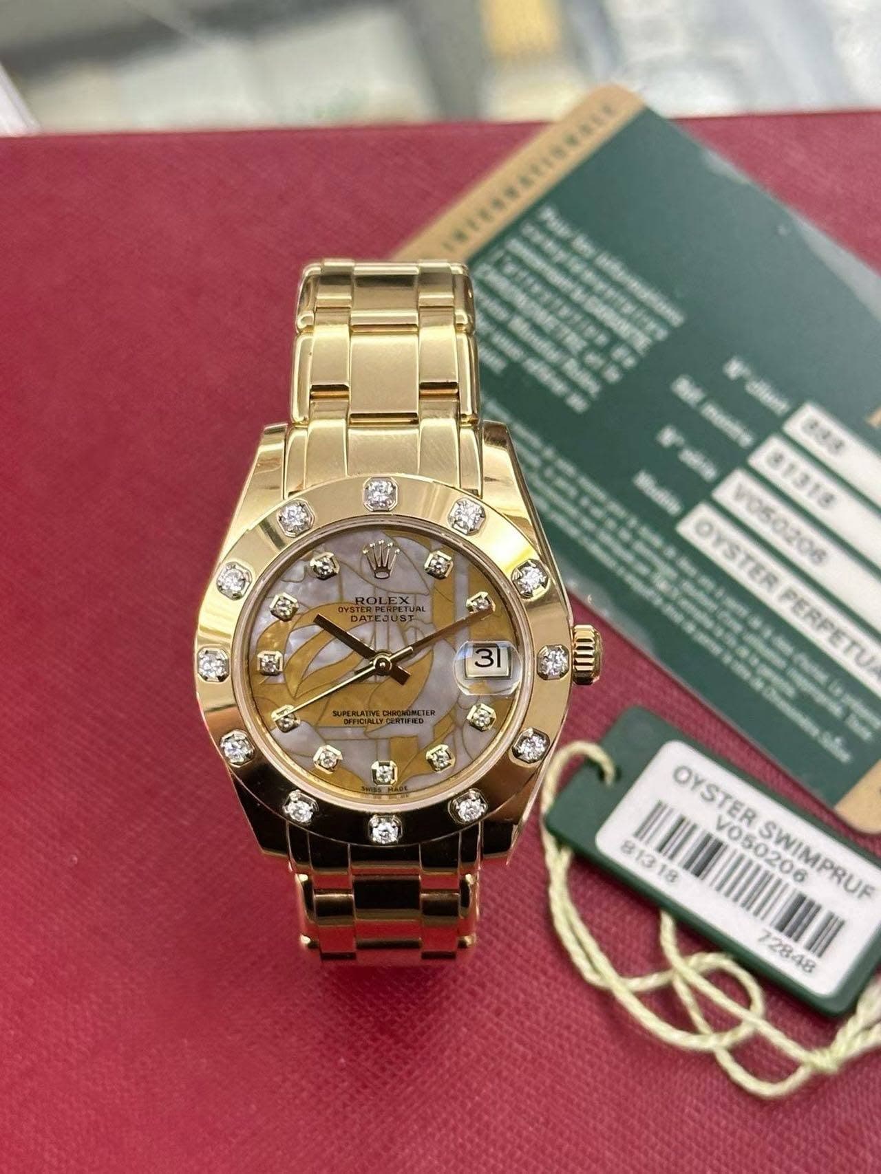 May be an image of wrist watch and text that says '45 M 81318 下めさき 휴더당 01318 OYSTER VO5020R V050206 PERPETU 31 cm OYSTER 813 18 V050206 OYSTERSWIMPRUF 05020M SWIMPRUF 12848 28'