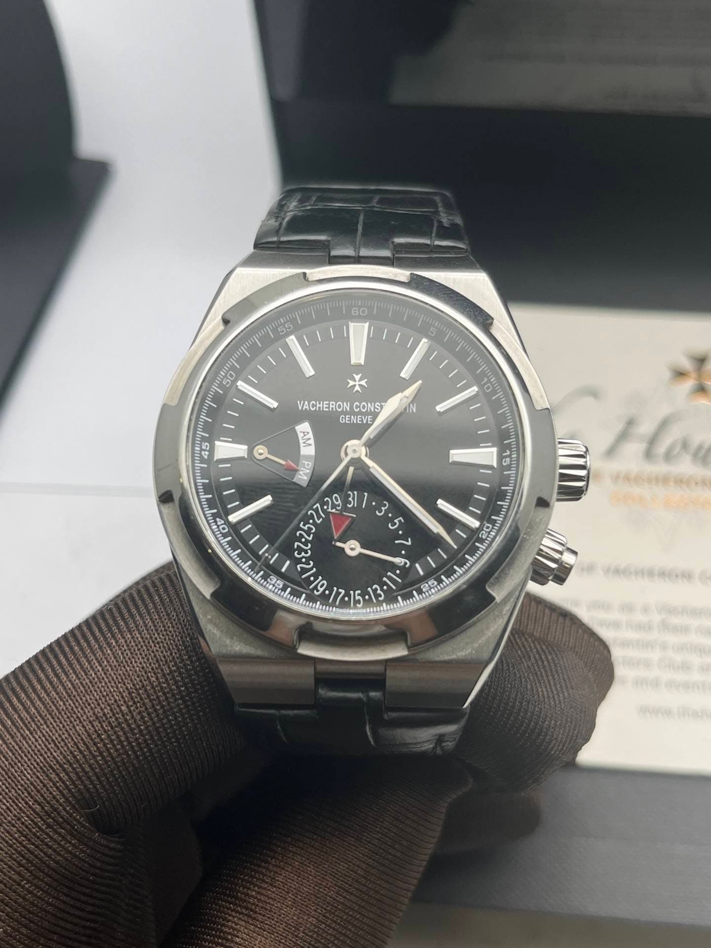 May be an image of wrist watch and text