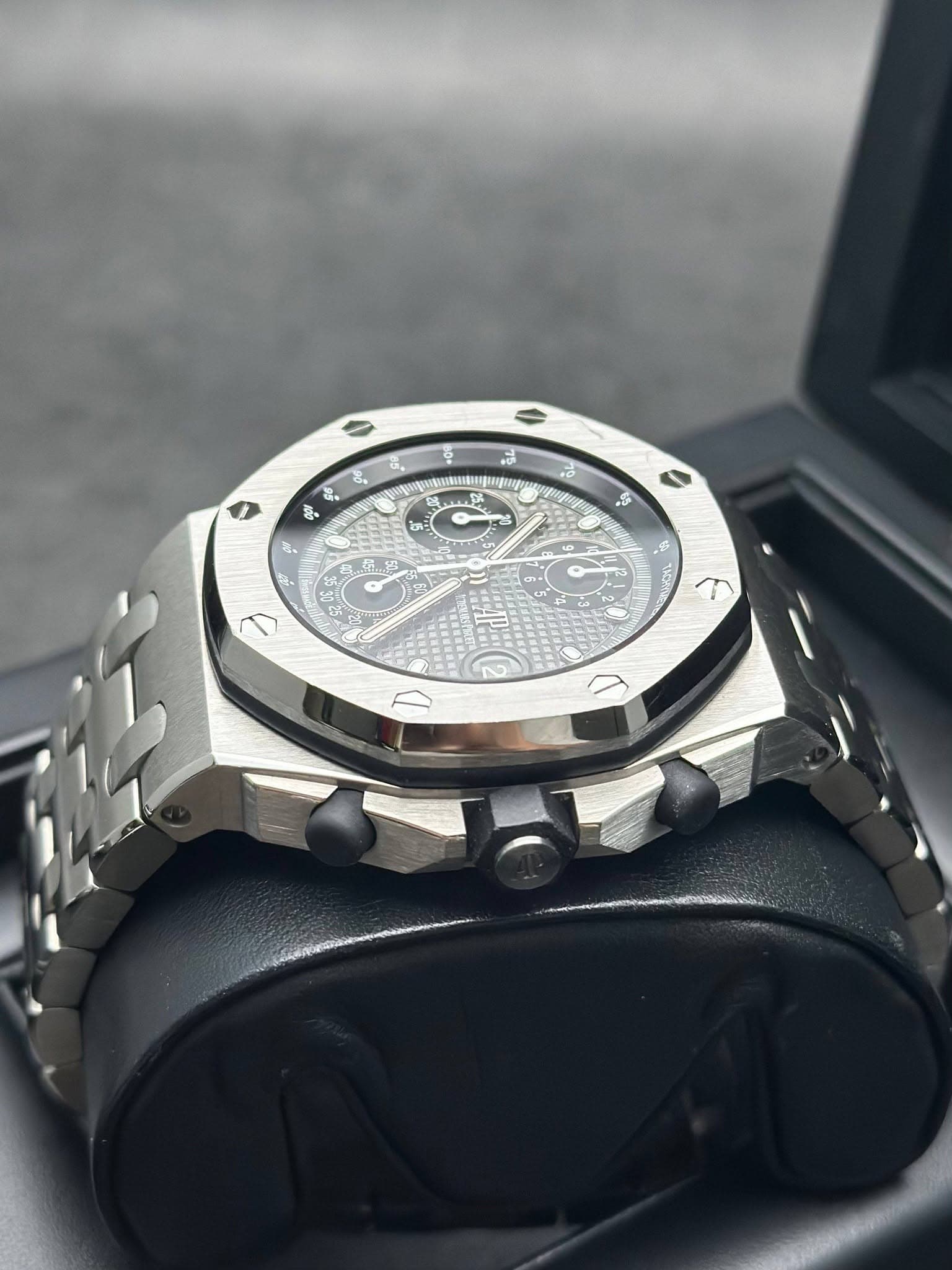 May be an image of wrist watch and text