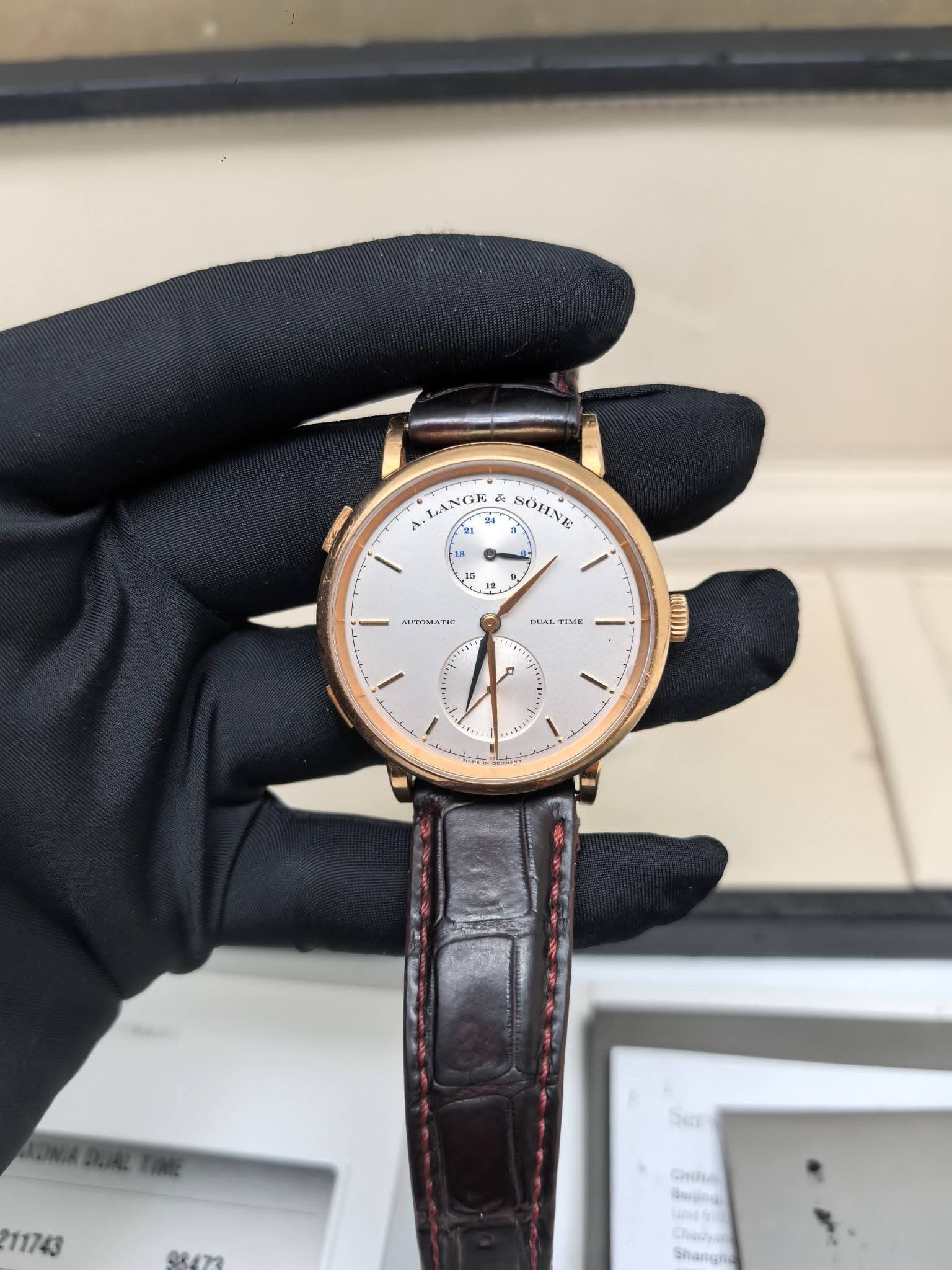 May be an image of wrist watch and text