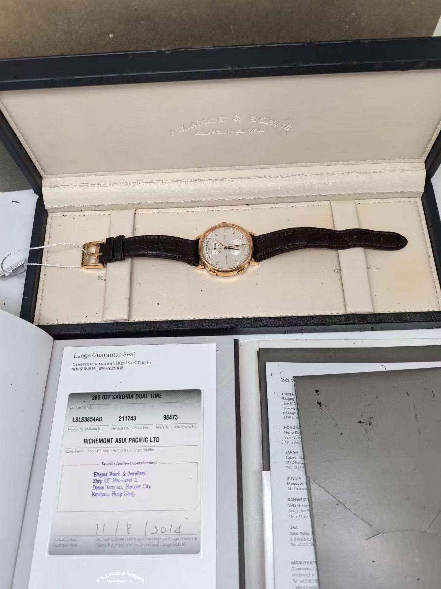 May be an image of wrist watch and text