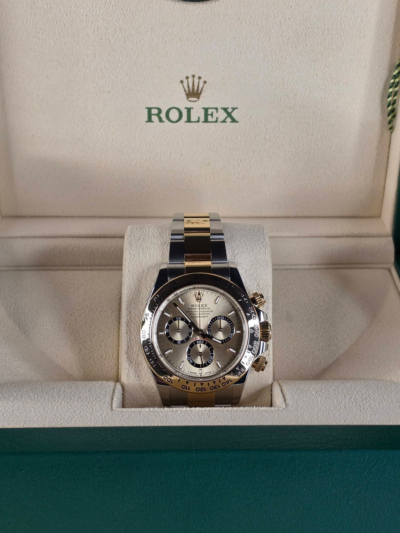 May be an image of wrist watch and text