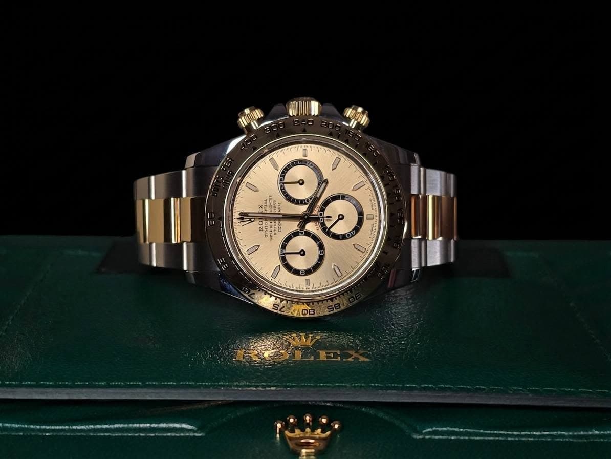 May be an image of wrist watch and text