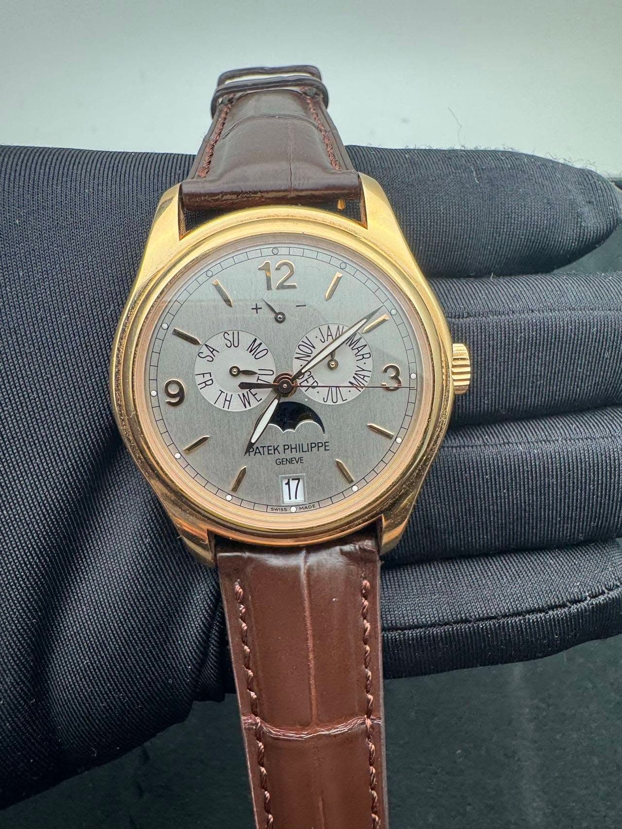 May be an image of wrist watch and text